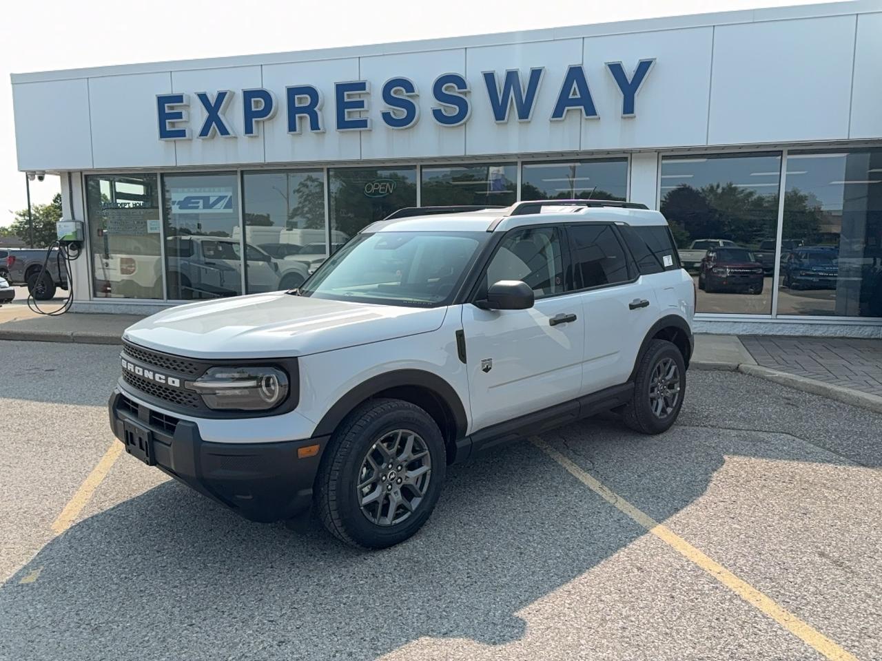 <p>Get ready to embark on your next adventure with the all-new 2026 Ford Bronco Sport BIG BEND, now available at Expressway Motors Ltd.! This rugged yet refined SUV is designed to conquer any terrain while keeping you comfortable and connected. The stunning Space White Metallic exterior glistens, hinting at the capabilities that lie beneath, while the inviting MEDIUM LT SMOKED TRUFFLE cloth interior with heated front buckets offers a welcoming embrace for every journey. Whether youre navigating city streets or exploring off-the-beaten-path, this Bronco Sport is your perfect companion.</p><p>Experience the thrill of the open road with the capable 1.5L 3-cylinder engine, paired with a smooth automatic transmission and a robust 4-wheel drive system, ensuring confidence in all Canadian driving conditions. With four doors and ample cargo space, this SUV/Crossover is as practical as it is adventurous. The 2026 Ford Bronco Sport BIG BEND is more than just a vehicle; its your ticket to freedom and exploration, meticulously crafted for those who crave excitement.</p><p>Here are five features that truly make this 2026 Ford Bronco Sport BIG BEND stand out:</p><ul><li><strong>REMOTE START:</strong> Imagine stepping into a perfectly pre-conditioned cabin, no matter the weather. With remote start, your Bronco Sport is ready when you are, ensuring ultimate comfort from the moment you open the door.</li><li><strong>ADAPTIVE CRUISE CONTROL:</strong> Navigate highway driving with ease and reduced fatigue. This intelligent system automatically adjusts your speed to maintain a set distance from the vehicle ahead, making long commutes feel effortless.</li><li><strong>SYNC 4:</strong> Stay seamlessly connected to your digital world. The intuitive SYNC 4 system offers advanced voice recognition and a responsive touchscreen, putting navigation, entertainment, and communication at your fingertips without distraction.</li><li><strong>4-Wheel Drive:</strong> Conquer any Canadian landscape with unwavering confidence. The robust 4-wheel drive system provides superior traction and control, allowing you to tackle snow, mud, and gravel with complete assurance.</li><li><strong>HEATED FRONT BUCKET SEATS:</strong> Embrace the chill of winter with immediate warmth. These luxurious heated front seats deliver comforting warmth on demand, transforming even the coldest mornings into cozy drives.</li></ul><p><strong><em>Powered by AutoIntelligence&trade;</em></strong></p><p>Vehicle information has been generated using artificial intelligence and is provided for informational purposes only. While efforts are made to ensure accuracy, please confirm all details directly with the dealer.</p><p class=MsoNormal style=margin: 0cm 0cm 8pt; line-height: 13.8pt; font-size: 12pt; font-family: Aptos, sans-serif;><strong><span style=font-family: Calibri, sans-serif;>2 locations to better serve YOU! &ndash; Stratford and New Hamburg</span></strong></p><p>&nbsp;</p><p class=MsoNormal style=margin: 0cm 0cm 8pt; line-height: 13.8pt; font-size: 12pt; font-family: Aptos, sans-serif;><strong><span style=font-family: Calibri, sans-serif;>New or Pre-Owned vehicles are shared between both locations &ndash; please contact Sales to confirm.</span></strong></p><p>&nbsp;</p><p class=MsoNormal style=margin: 0cm 0cm 8pt; line-height: 13.8pt; font-size: 12pt; font-family: Aptos, sans-serif;><span style=font-family: Calibri, sans-serif;>Purchasing a new vehicle from&nbsp;<strong>Expressway&nbsp;</strong>is a decision that you will be able to make with confidence knowing that you&rsquo;re getting the most that a vehicle and dealership can offer to you.</span></p><p>&nbsp;</p><p class=MsoNormal style=margin: 0cm 0cm 8pt; line-height: 13.8pt; font-size: 12pt; font-family: Aptos, sans-serif;><strong><span style=font-family: Calibri, sans-serif;>Warranty:</span></strong><span style=font-family: Calibri, sans-serif;>&nbsp;We offer best in class Extended Protection options with flexible terms that can be tailored to your needs at a price that you can afford.</span></p><p>&nbsp;</p><p class=MsoNormal style=margin: 0cm 0cm 8pt; line-height: 13.8pt; font-size: 12pt; font-family: Aptos, sans-serif;><strong><span style=font-family: Calibri, sans-serif;>Finance:</span></strong><span style=font-family: Calibri, sans-serif;>&nbsp;At Expressway we have some of the best Finance Managers in the business that work with all the Major banks and Core Lenders. The Relationships we have built will help guarantee that you get the lowest rate possible</span></p><p>&nbsp;</p><p class=MsoNormal style=margin: 0cm 0cm 8pt; line-height: 13.8pt; font-size: 12pt; font-family: Aptos, sans-serif;><span style=font-family: Calibri, sans-serif;>Check out our great selection of vehicles at Expressway in New Hamburg and Stratford Locations!</span></p><p>&nbsp;</p><p class=MsoNormal style=margin: 0cm 0cm 8pt; line-height: 13.8pt; font-size: 12pt; font-family: Aptos, sans-serif;><strong><span style=font-family: Calibri, sans-serif;>Call Expressway for your quote today!</span></strong></p><p>&nbsp;</p><p class=MsoNormal style=margin: 0cm 0cm 8pt; line-height: 13.8pt; font-size: 12pt; font-family: Aptos, sans-serif;><strong><span style=font-family: Calibri, sans-serif;>New Hamburg:</span></strong><span style=font-family: Calibri, sans-serif;>&nbsp;<a href=tel:+15196623900><span style=color: #0563c1;>519*662*3900</span></a></span></p><p>&nbsp;</p><p class=MsoNormal style=margin: 0cm 0cm 8pt; line-height: 13.8pt; font-size: 12pt; font-family: Aptos, sans-serif;><strong><span style=font-family: Calibri, sans-serif;>Stratford</span></strong><span style=font-family: Calibri, sans-serif;>:&nbsp;<a href=tel:+15192713900><span style=color: #0563c1;>519*271*3900</span></a></span></p><p>&nbsp;</p><p class=MsoNormal style=margin: 0cm 0cm 8pt; line-height: 13.8pt; font-size: 12pt; font-family: Aptos, sans-serif;><span style=font-family: Calibri, sans-serif;>or visit us online at:&nbsp;&nbsp;<a href=https://www.expresswayford.com/ target=_blank rel=noopener><span style=color: #0563c1;>www. expresswayford .com</span></a>&nbsp;or&nbsp;<a href=https://www.expresswaylincoln.ca/ target=_blank rel=noopener><span style=color: #0563c1;>www. expresswaylincoln .ca</span></a></span></p><p>&nbsp;</p><p class=MsoNormal style=margin: 0cm 0cm 8pt; line-height: 13.8pt; font-size: 12pt; font-family: Aptos, sans-serif;><strong><span style=font-family: Calibri, sans-serif;>We pride ourselves in No Hassle, No Pressure, Honest Service. We practice full disclosure with all our used vehicles and have a Better Business Bureau A+ rating!</span></strong></p><p>&nbsp;</p><p class=MsoNormal style=margin: 0cm 0cm 8pt; line-height: 13.8pt; font-size: 12pt; font-family: Aptos, sans-serif;><span style=font-size: 8pt; font-family: Calibri, sans-serif;>**Expressway reserves the right to correct any errors and omissions that occur on this site. (Incl, but not limited to price, incl. Event price rollbacks, vehicles features & more).</span></p><p>&nbsp;</p><p class=MsoNormal style=margin: 0cm 0cm 8pt; line-height: 13.8pt; font-size: 12pt; font-family: Aptos, sans-serif;><span style=font-size: 8pt; font-family: Calibri, sans-serif;>** Expressway is a Fair Market Price Dealership pricing subject to change with current market conditions</span></p>