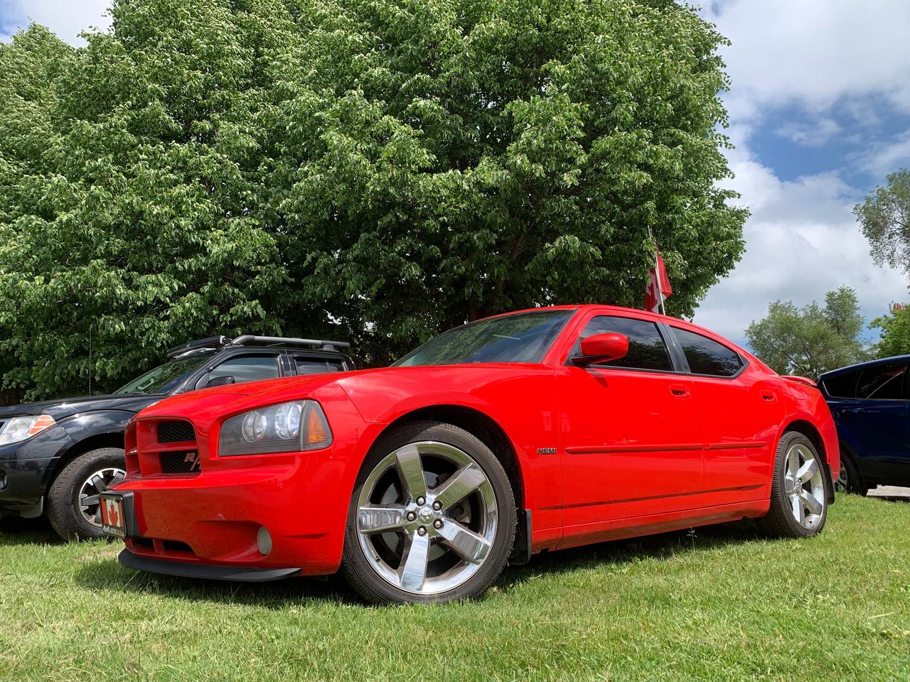 <p style=text-align: center;><strong>Please Call or Text Mike 519-502-8169 or&nbsp;Miguel 519-830-0895 to book your test drive.</strong></p><p style=text-align: center;>Super Clean like a time machine! LIMITED PRODUCTION <strong><u>2008 DODGE CHARGER R/T HEMI (340HP / 390 LB-FT TORQUE)</u></strong></p><p style=text-align: center;><u>Only&nbsp;</u><strong><u>192,000</u></strong><u>&nbsp;</u>very well maintained&nbsp;<strong>kms! 2 OWNERS, SAME OWNER SINCE 2013! (last 13 years)</strong></p><p style=text-align: center;><strong>VIDEO OF THE CAR AT <a href=https://www.4x4autosales.ca/product-page/2008-dodge-charger-r-t-hemi-v8-1>WWW.4X4AUTOSALES.CA </a></strong><strong>copy and paste if the link wont open</strong></p><p style=text-align: center;><strong>This car is</strong>&nbsp;<strong>immaculate</strong> inside and out and underneath. Pride of ownership shows, this car was oil sprayed and parked indoors.</p><p style=text-align: center;>Beautiful in every way, a real head turner, custom exhaust, stereo and tail lights, Sounds amazing both inside and especially outside :)</p><p style=text-align: center;>DRIVE IT ON SUNDAYS...DRIVE IT ALL SUMMER.....OR KEEP IN YOUR BARN AS CLASSIC.&nbsp; - This one only goes one way in value if properly kept.</p><p style=text-align: center;><strong>5.7L Hemi V8, Leather, Sunroof, 20 chrome wheels, Pioneer Audio, Clarion / Alpine amp, Privacy glass, Custom exhaust, Car looks runs and drives like new.</strong></p><p style=text-align: center;><strong>Black Leather Heated Seats with red piping, Sunroof, Spoiler...</strong></p><p style=text-align: center;>This is the one you waited for! <em><span style=text-decoration: underline;>About as much fun as you can buy under 15k!</span></em></p><p style=text-align: center;><strong><u>&nbsp;SUMMER SALE PRICED NOW ONLY $14,888!+</u></strong><strong><u>HST.</u></strong></p><p style=text-align: center;><strong><u>NO HIDDEN FEES OR CHARGES!,</u></strong><strong>&nbsp;INCLUDES SAFETY</strong></p><p style=text-align: center;><strong>EXTENDED WARRANTY AND FINANCING AVAILABLE.</strong></p><p style=text-align: center;><strong>COMPLETE INTERIOR AND EXTERIOR DETAIL&nbsp;</strong></p><p style=text-align: center;><a href=https://vhr.carfax.ca/?id=hP8+KHR765IoaY88qDDsGev2qtvijoa3 target=_blank rel=noopener><strong>COMPLIMENTARY CARFAX HISTORY REPORT.</strong></a></p><p style=text-align: center;><strong><u>Please Call/Text Mike 519-830-0895 or Miguel 519-502-8169 to Book your test drive.</u></strong></p><p style=text-align: center;>Visit us today at&nbsp;<strong>599 York Rd, Guelph</strong>&nbsp;- Right next door to Esso.</p><p style=text-align: center;>www.4x4AUTOSALES.ca - TRUCKIN AWESOME!</p>