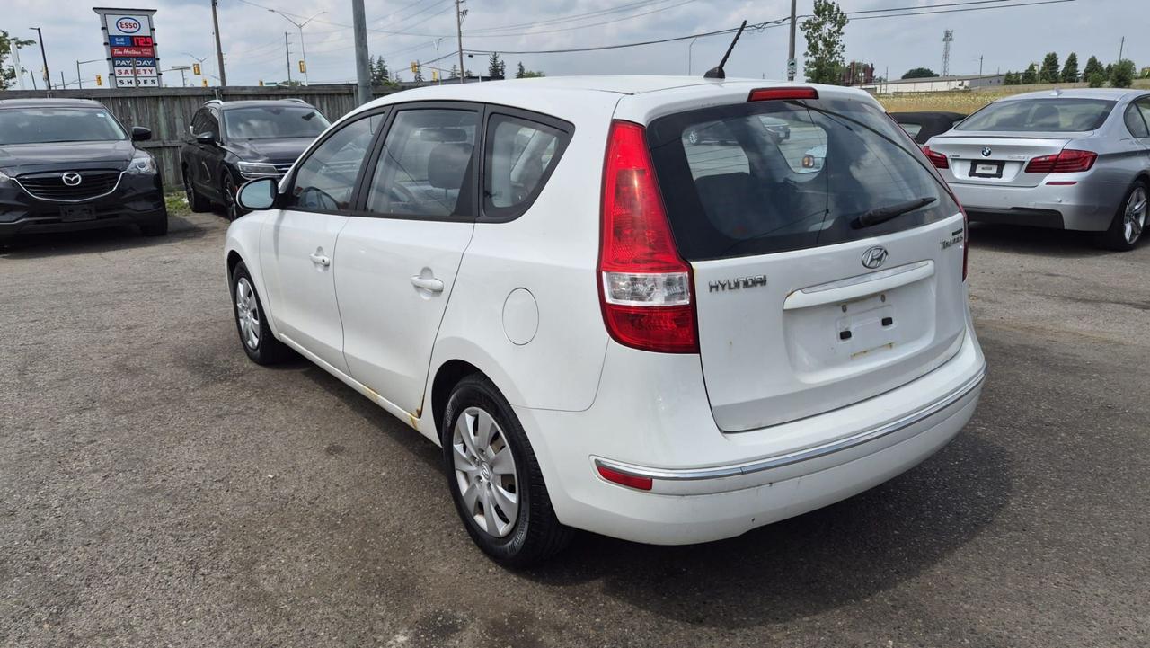 2010 Hyundai Elantra Touring GLS, MANUAL, WAGON, 4 CYL, CERTIFIED Photo