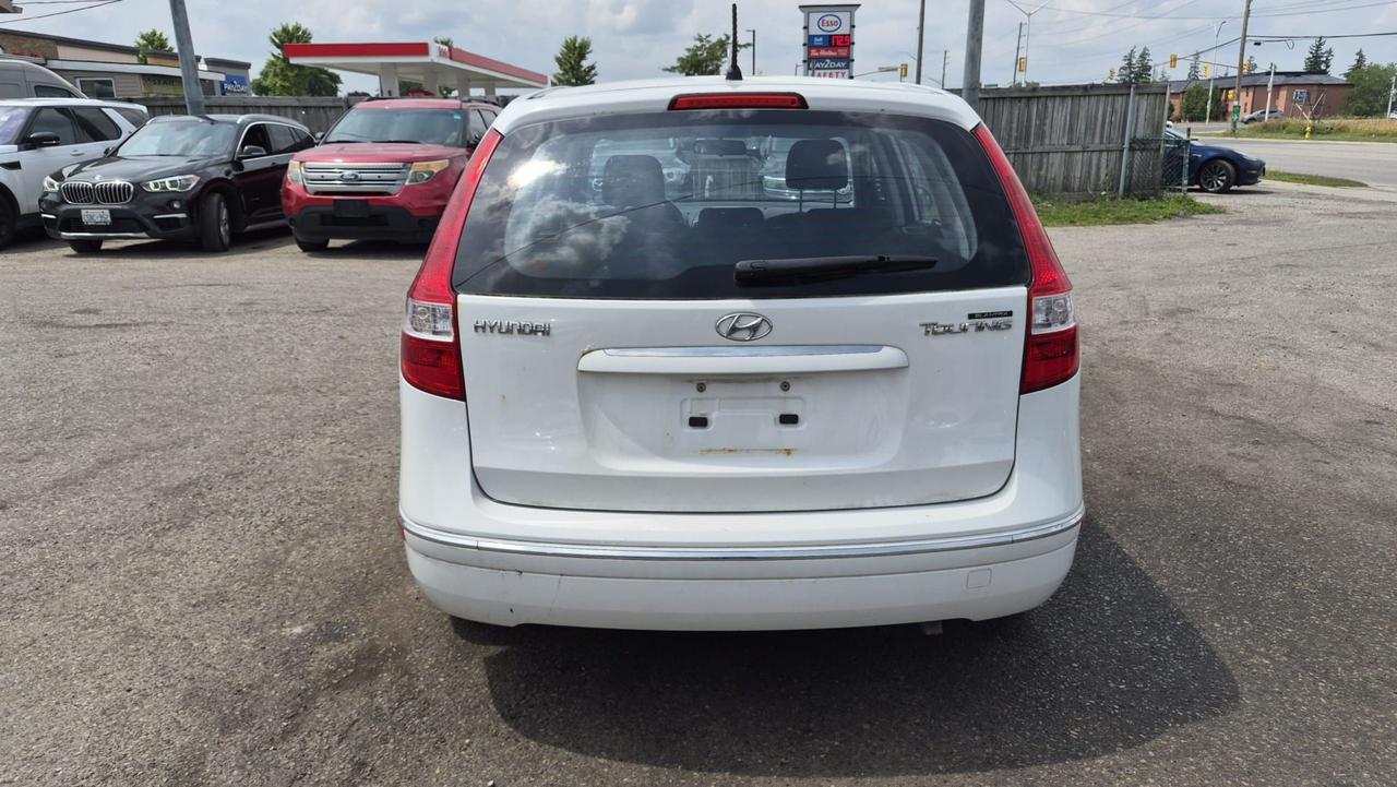 2010 Hyundai Elantra Touring GLS, MANUAL, WAGON, 4 CYL, CERTIFIED Photo