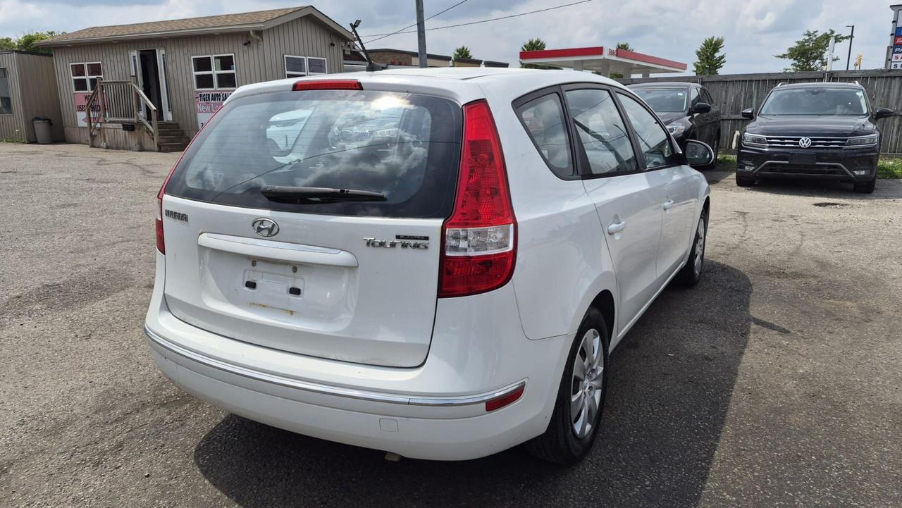 2010 Hyundai Elantra Touring GLS, MANUAL, WAGON, 4 CYL, CERTIFIED Photo