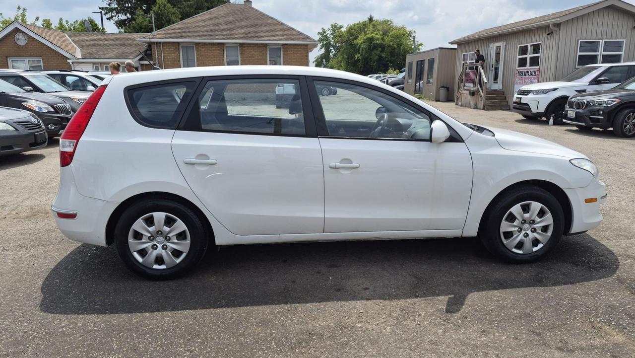 2010 Hyundai Elantra Touring GLS, MANUAL, WAGON, 4 CYL, CERTIFIED Photo