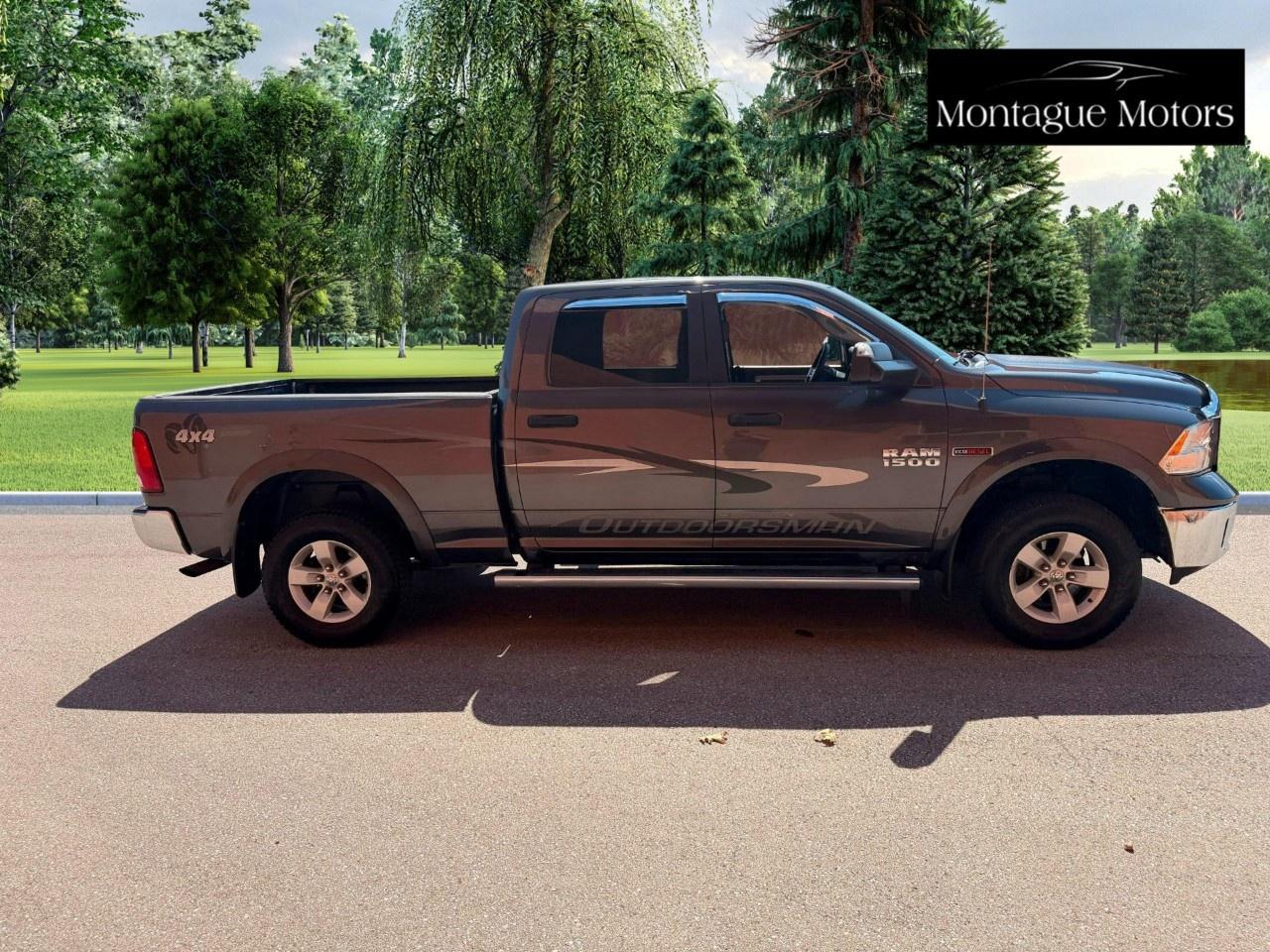 2016 RAM 1500 4WD Crew Cab 6.4 Ft Box Outdoorsman Photo