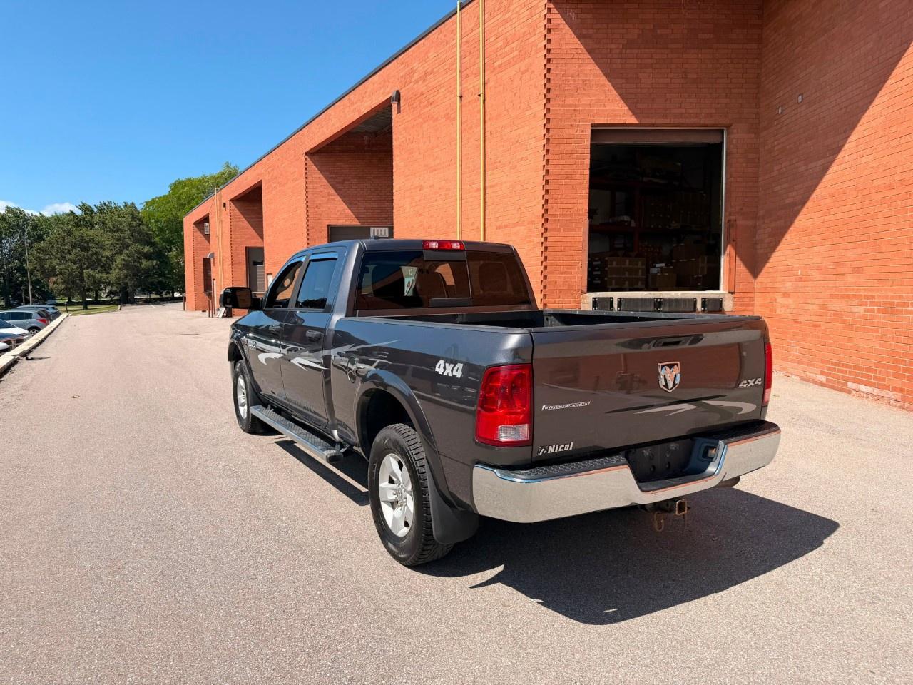 2016 RAM 1500 4WD Crew Cab 6.4 Ft Box Outdoorsman Photo