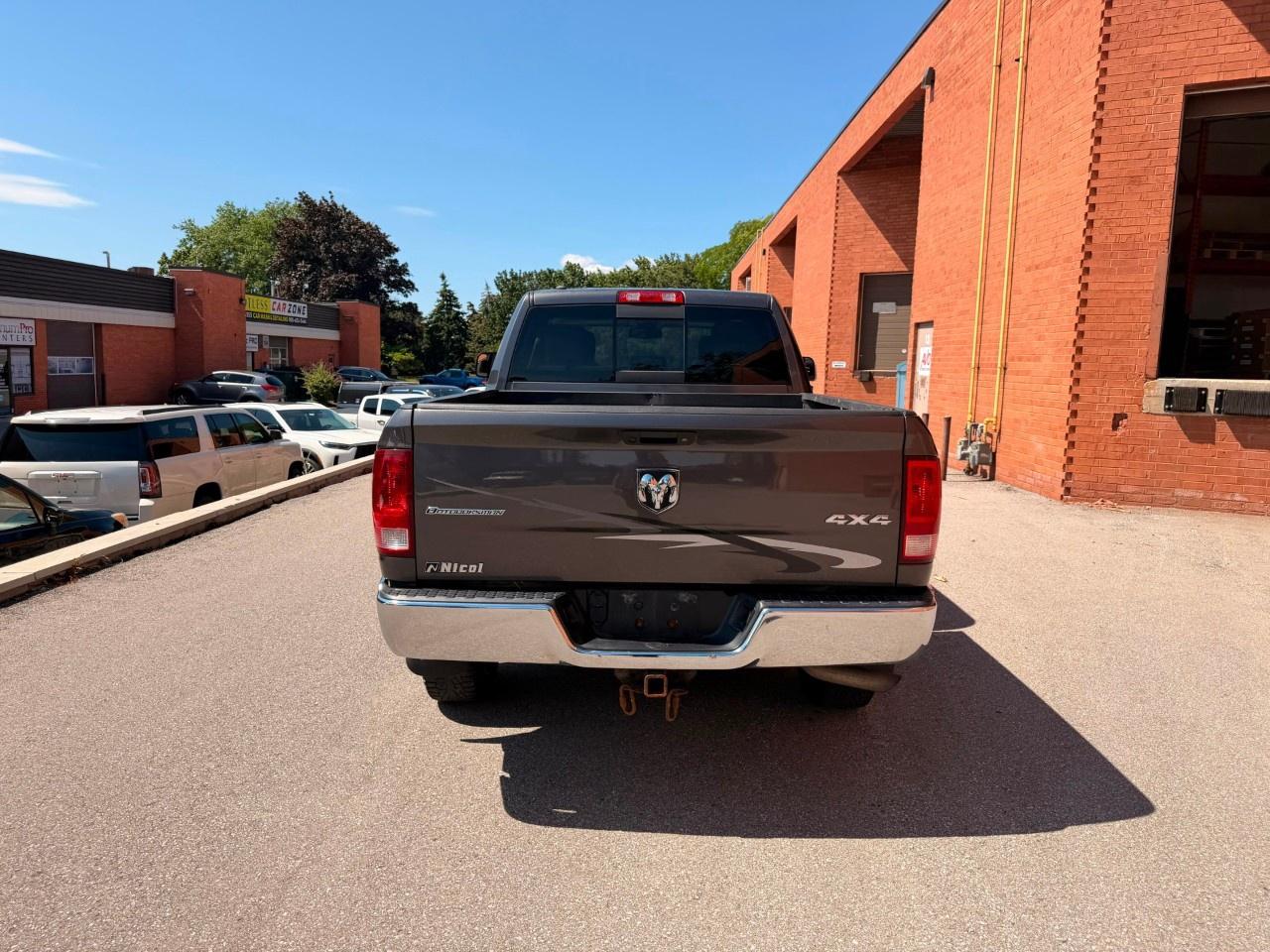 2016 RAM 1500 4WD Crew Cab 6.4 Ft Box Outdoorsman Photo
