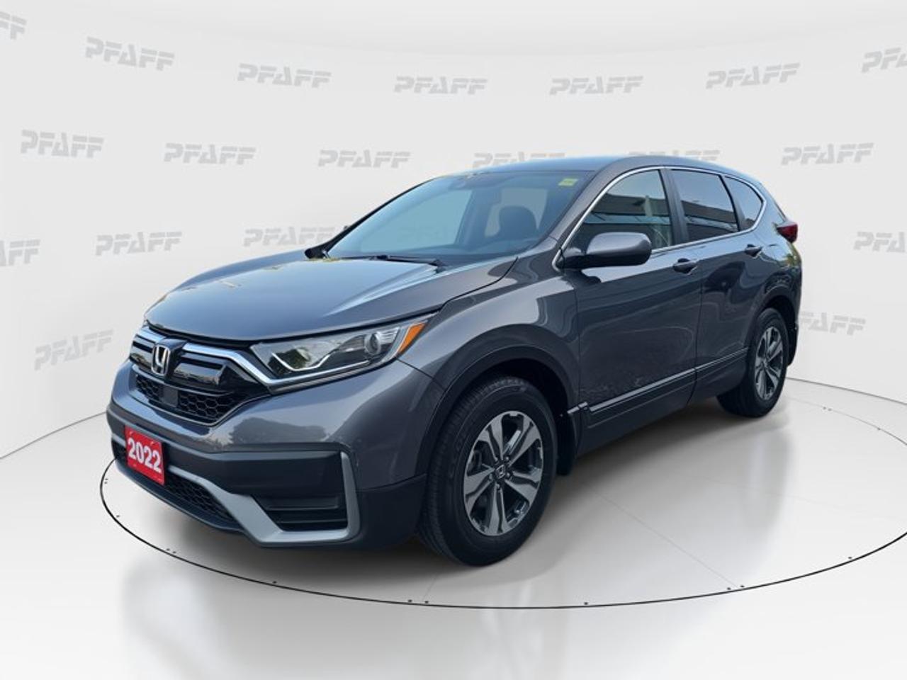 ** This disclosure applied to pre-owned inventory only: The online price includes a $1000 financing credit. For cash purchases, an additional $1000 dollars will be added to the price.*The 2022 Honda CR-V LX is a smart choice for drivers who want comfort, confidence, and everyday value in a compact SUV. Offered by Honda of Thornhill in Thornhill, this used model shows 70,346 km and pairs a sleek Silver exterior with a Black interior for a clean, modern look.This 2022 Honda CR-V LX delivers the practicality families need and the ease commuters appreciate. With four doors, automatic transmission, and front-wheel drive, it is well suited to city travel, highway cruising, and daily errands. Its solid reputation, roomy cabin, and user-friendly design continue to make it a favourite in its class.FEATURES OF THE CR-V LXSilver exterior with clean modern presenceAutomatic transmission for smooth daily drivingFront-wheel drive for efficient road mannersFour-door layout for easy passenger accessADVANCED SAFETY FEATURESAnti-lock braking system for controlled stopsStability control supports confident handlingTraction control improves slippery-road gripLane departure warning adds driving awarenessPERFORMANCE AND EFFICIENCYFront-wheel drive supports balanced fuel efficiencyAutomatic transmission provides smooth accelerationPower steering helps easy urban manoeuvresAdaptive cruise control eases highway travelCOMFORT AND CONVENIENCEHeated front seats for cold morningsFront air conditioning keeps cabin comfortableCruise control supports relaxed longer drivesRemote starter adds everyday convenienceTECHNOLOGY AND CONNECTIVITYBluetooth integration supports hands-free communicationSmart device integration keeps apps accessibleSteering wheel audio controls simplify useBackup camera helps with reversing confidenceCARGO SPACERear cargo area suits daily essentialsFour-door access helps loading passengers easilyRear spoiler adds sporty utility appealFlexible SUV layout supports busy lifestylesAWARDS & RECOGNITIONSTop Safety Pick, Insurance Institute for Highway Safety, 2022Best Compact Utility Vehicle, The Car Guide, 2022WHAT OTHER OWNERS LIKEComfortable ride quality for daily commutesEasy-to-use controls and clear visibilitySpacious cabin for passengers and gearStrong sense of reliability and valueThis 2022 Honda CR-V LX stands out with practical features that matter every day. Heated mirrors, power windows, keyless entry, aluminum wheels, automatic headlights, tire pressure monitoring, child safety locks, and an adjustable steering wheel all add useful function without unnecessary complexity.Drivers shopping for a dependable used SUV will appreciate how this 2022 Honda CR-V LX balances comfort, safety, and convenience. It is a versatile vehicle that fits family routines, work commutes, and weekend plans with ease. Available now at Honda of Thornhill, this CR-V LX is ready to deliver proven Honda quality in a package that feels right at home in every season.This 2022 Honda CR-V LXs VIN is: 2HKRW1H23NH000845 .
