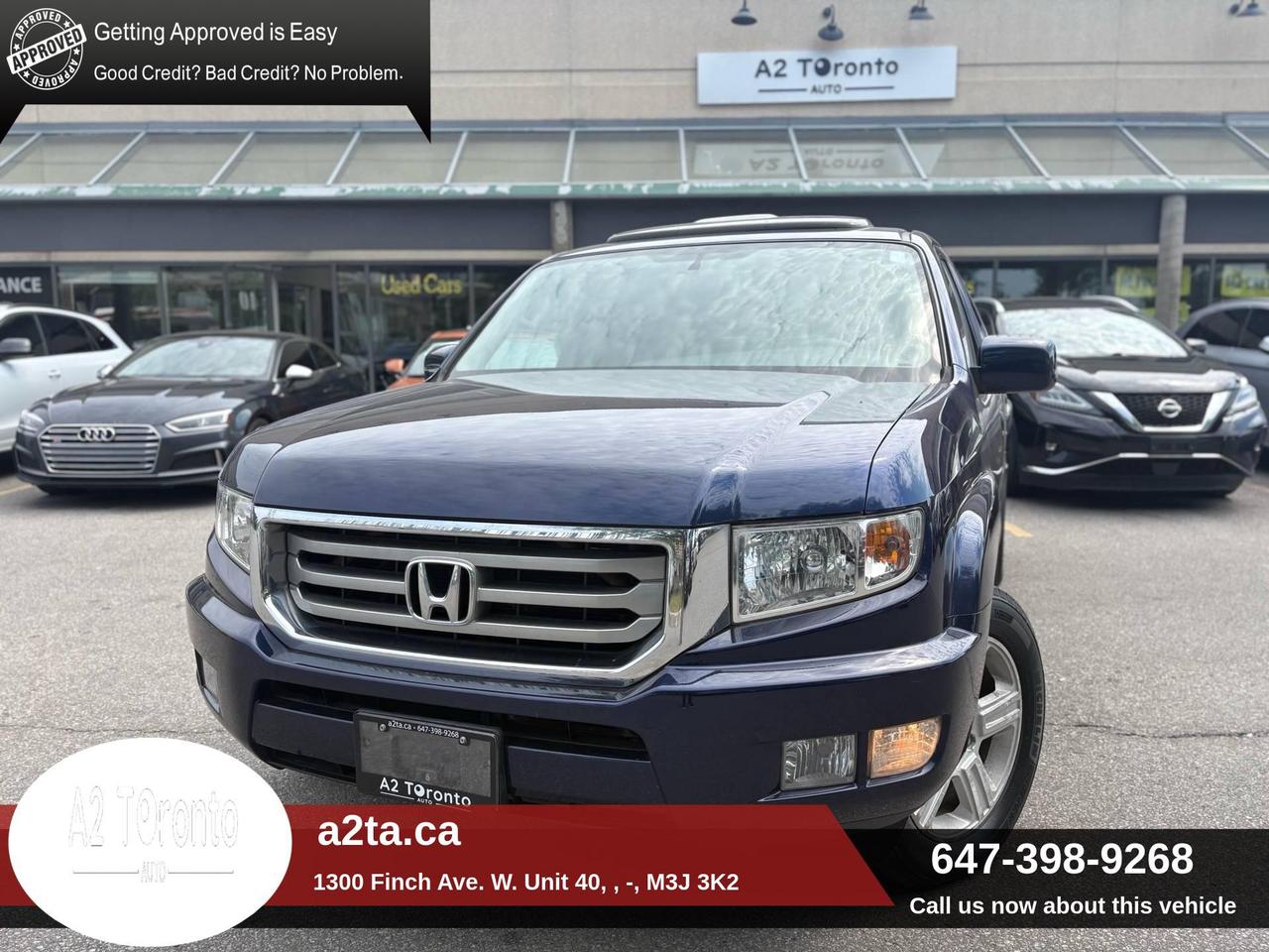 2014 Honda Ridgeline 4WD Crew Cab Touring Photo0