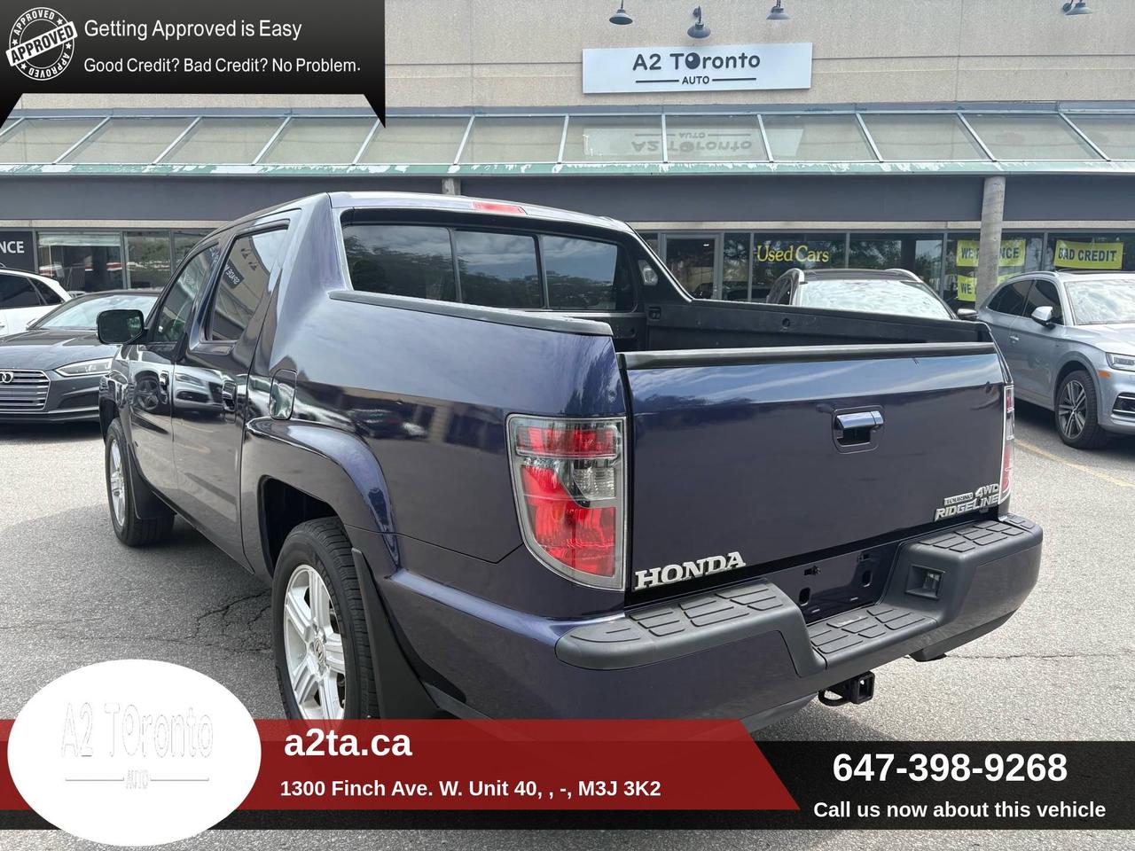 2014 Honda Ridgeline 4WD Crew Cab Touring Photo