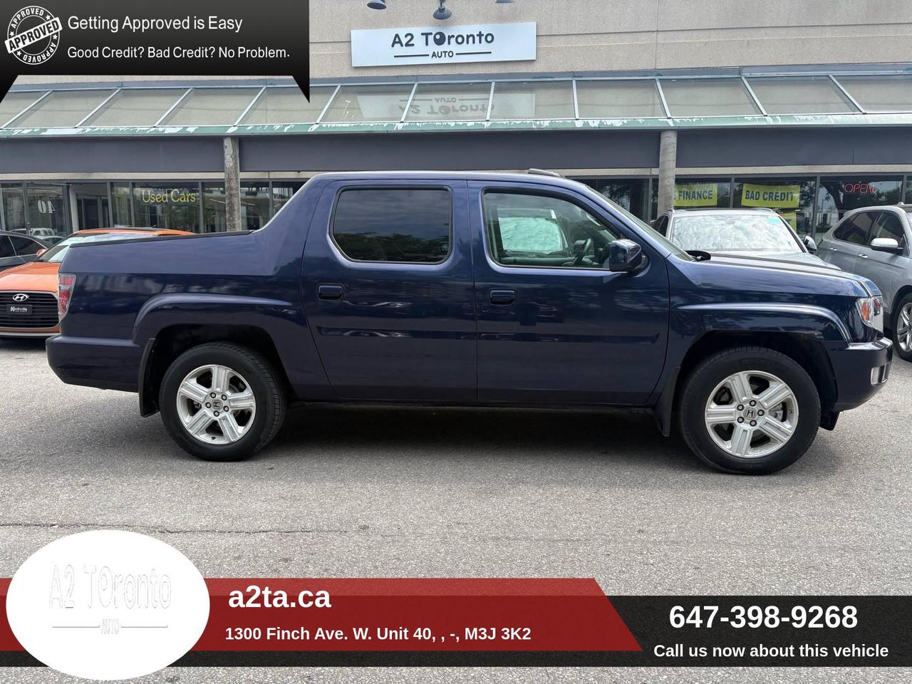 2014 Honda Ridgeline 4WD Crew Cab Touring Photo