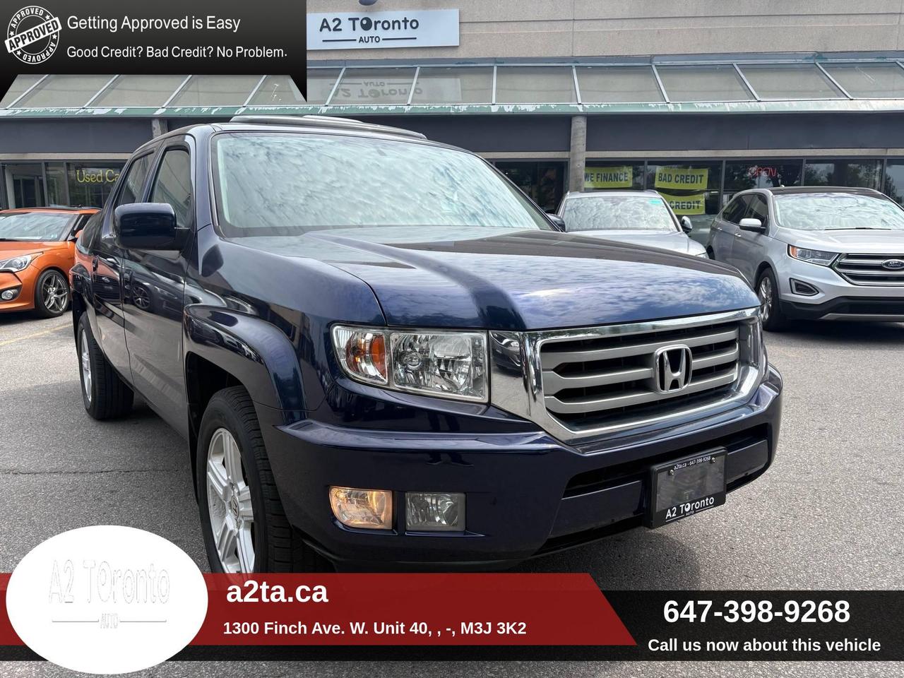 2014 Honda Ridgeline 4WD Crew Cab Touring Photo