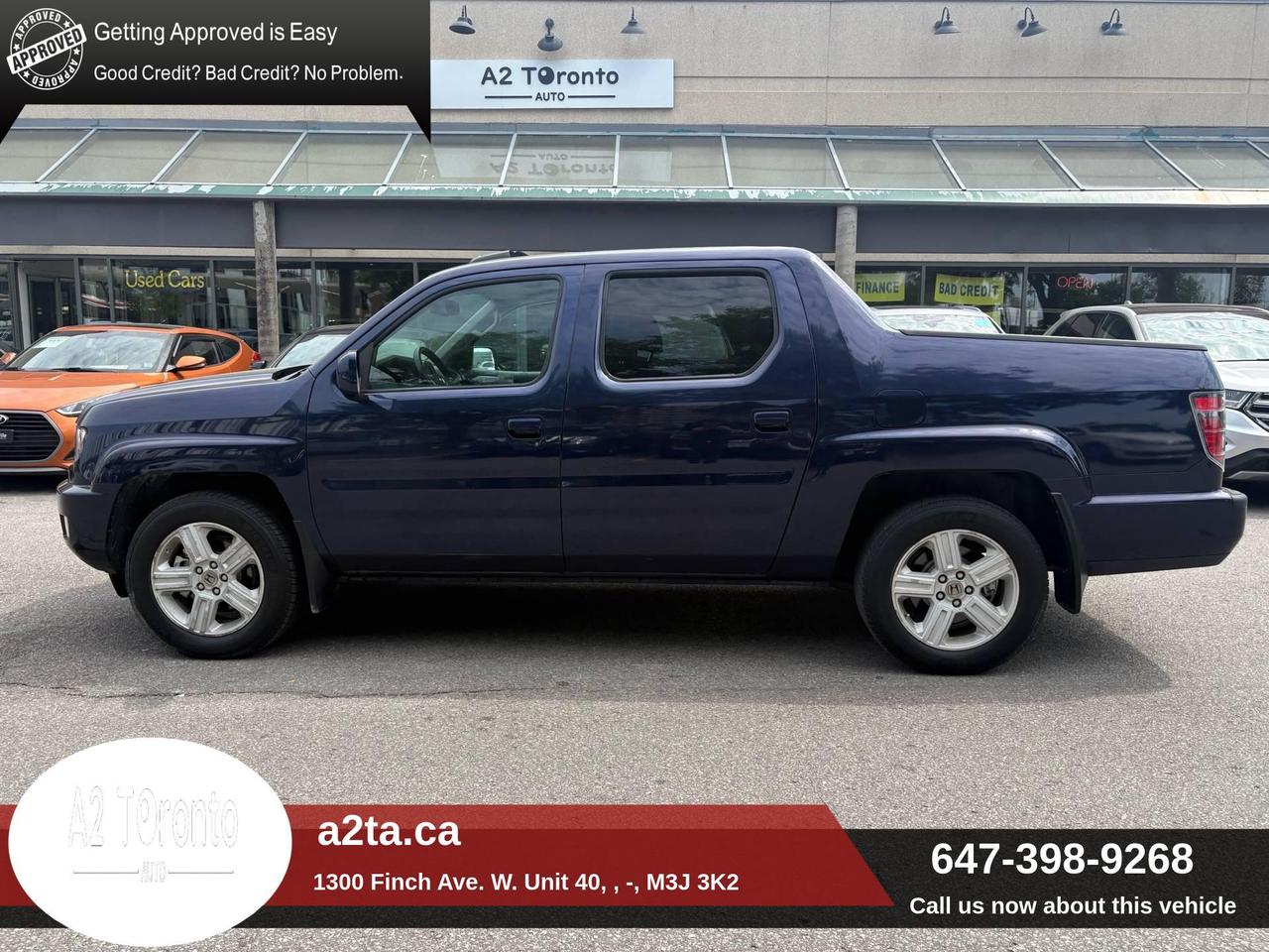 2014 Honda Ridgeline 4WD Crew Cab Touring Photo