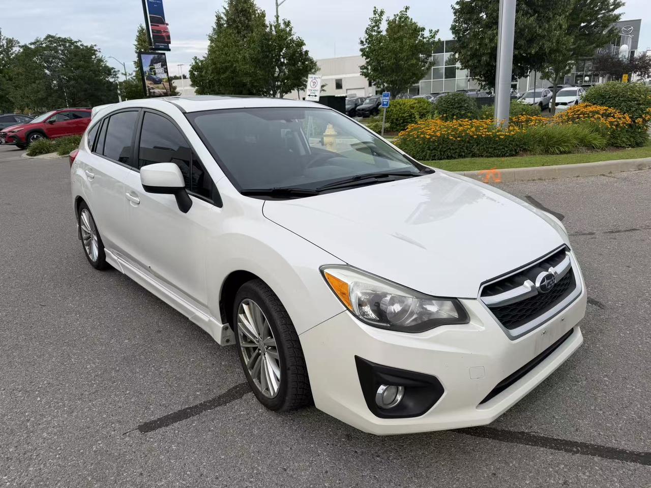 2013 Subaru Impreza 5dr HB CVT 2.0i w/Touring Pkg Photo