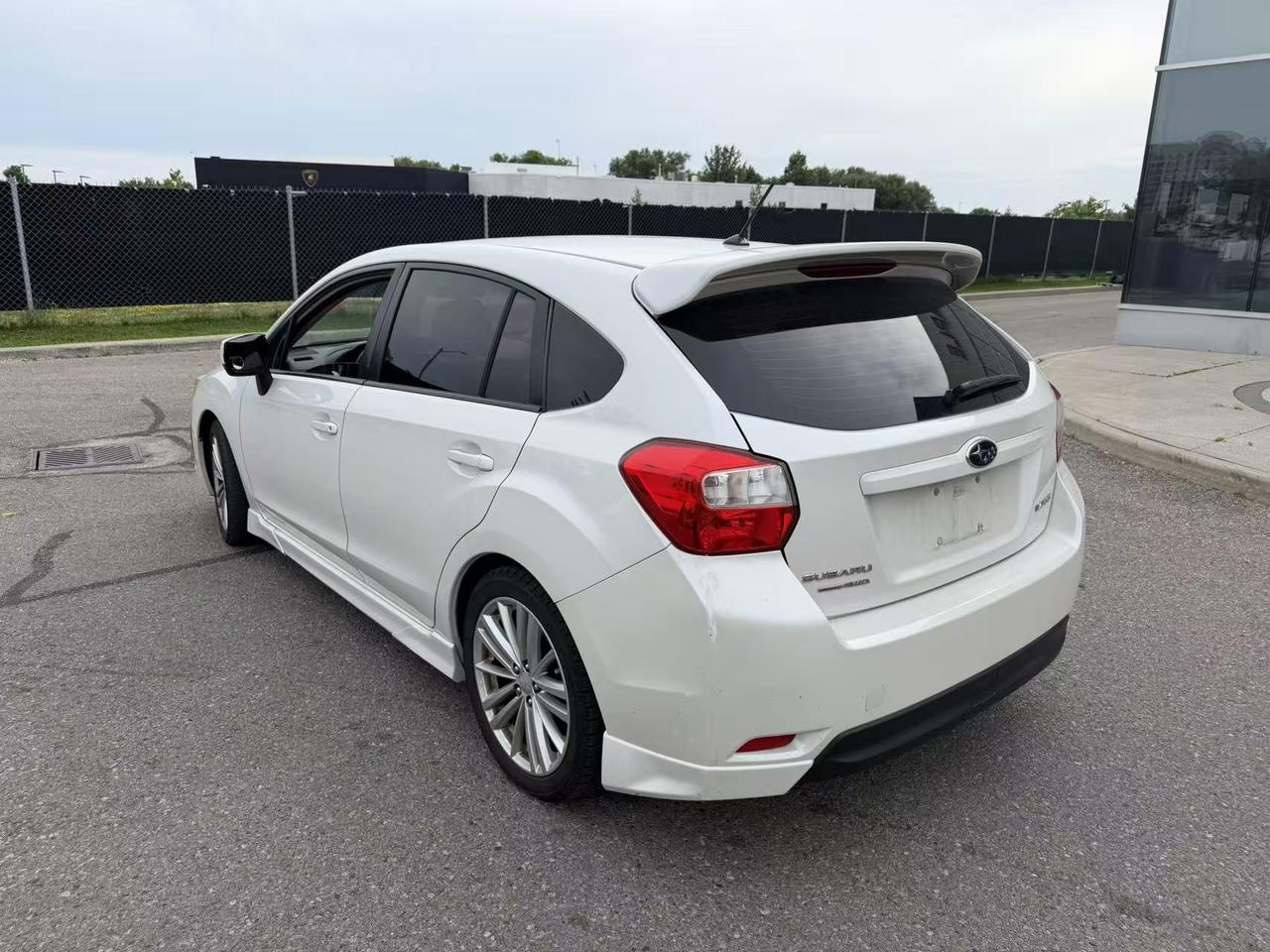2013 Subaru Impreza 5dr HB CVT 2.0i w/Touring Pkg Photo