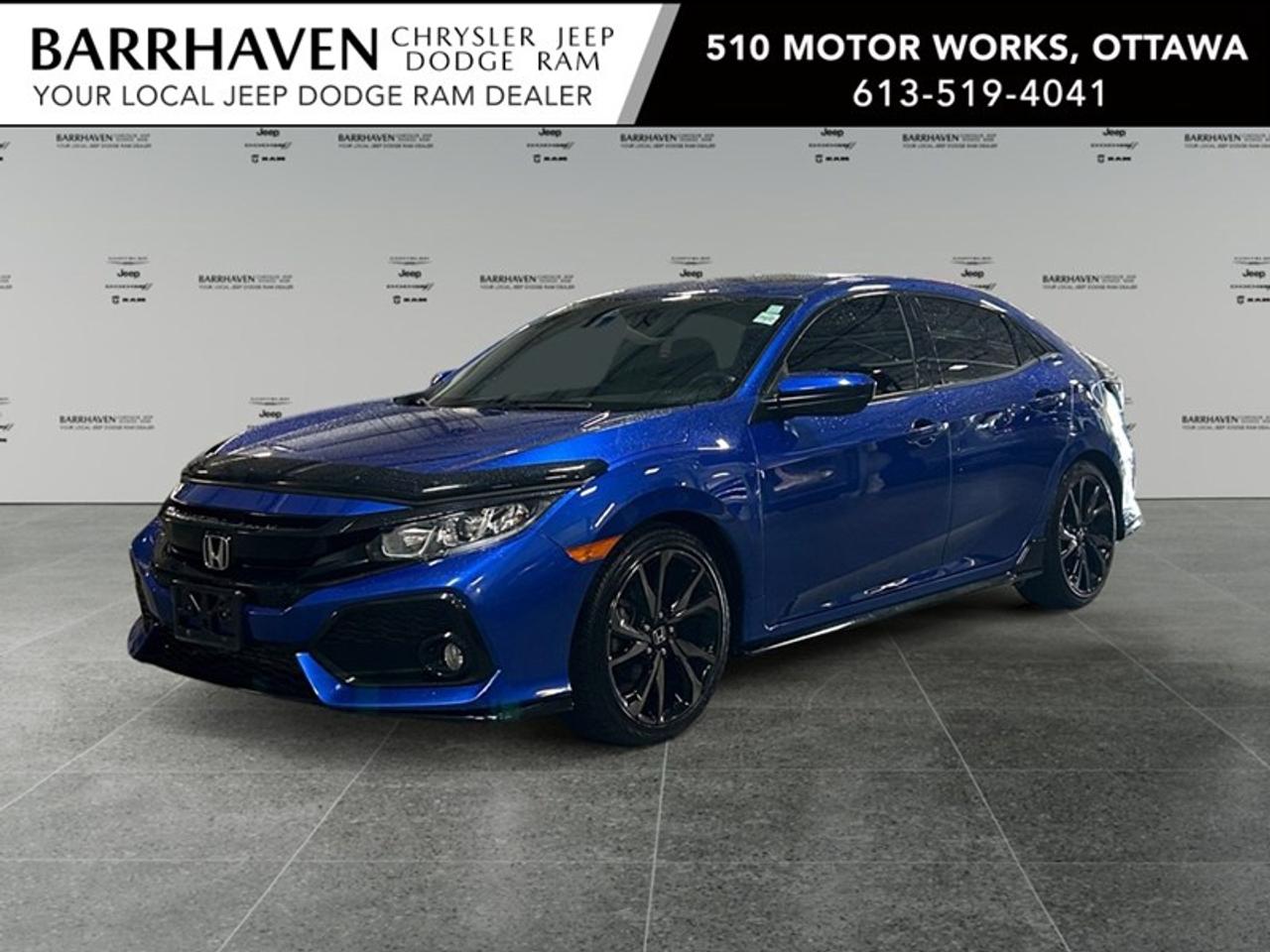 The 2019 Honda Civic Hatchback Sport Manual Hatchback in striking blue is a front-wheel-drive dynamo ready to elevate your driving experience. Renowned for its agile handling, this hatchback is perfect for city commutes and open-road adventures alike. The exterior catches the eye with a modern design complemented by stylish alloy wheels. Step inside to find a comfortable, well-appointed interior featuring heated front seats and a leather steering wheel, ensuring a pleasant drive every time. The sunroof enhances the airy feel of the cabin, letting in natural light and fresh air. Technologically advanced, the Civic Hatchback Sport offers a suite of features designed for convenience and safety: a backup camera for easy reversing, Bluetooth connectivity for hands-free calls and audio streaming, smart device integration to keep you in control, and a touch of luxury with heated mirrors and power windows. Safety is prioritized with features like lane assist and adaptive cruise control, providing peace of mind on the road. This sporty hatchback is an ideal choice for young professionals and families seeking a blend of style, efficiency, and modern technology. Get in touch with Barrhaven Jeep Dodge Chrysler Ram to schedule a test drive and experience the 2019 Honda Civic Hatchback Sport for yourself.