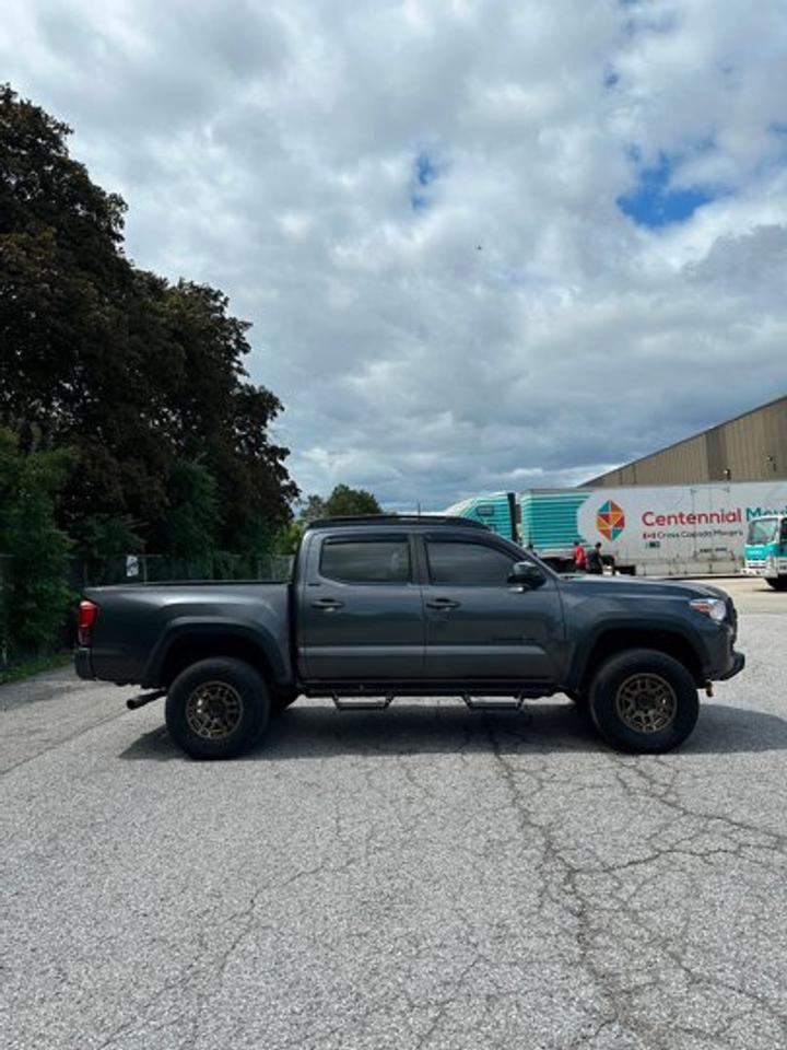2023 Toyota Tacoma Trail Edition Double Cab 4X4 | Factory Lift | Bronze Wheels | Power Seat | Heated Seats | and More ! Photo