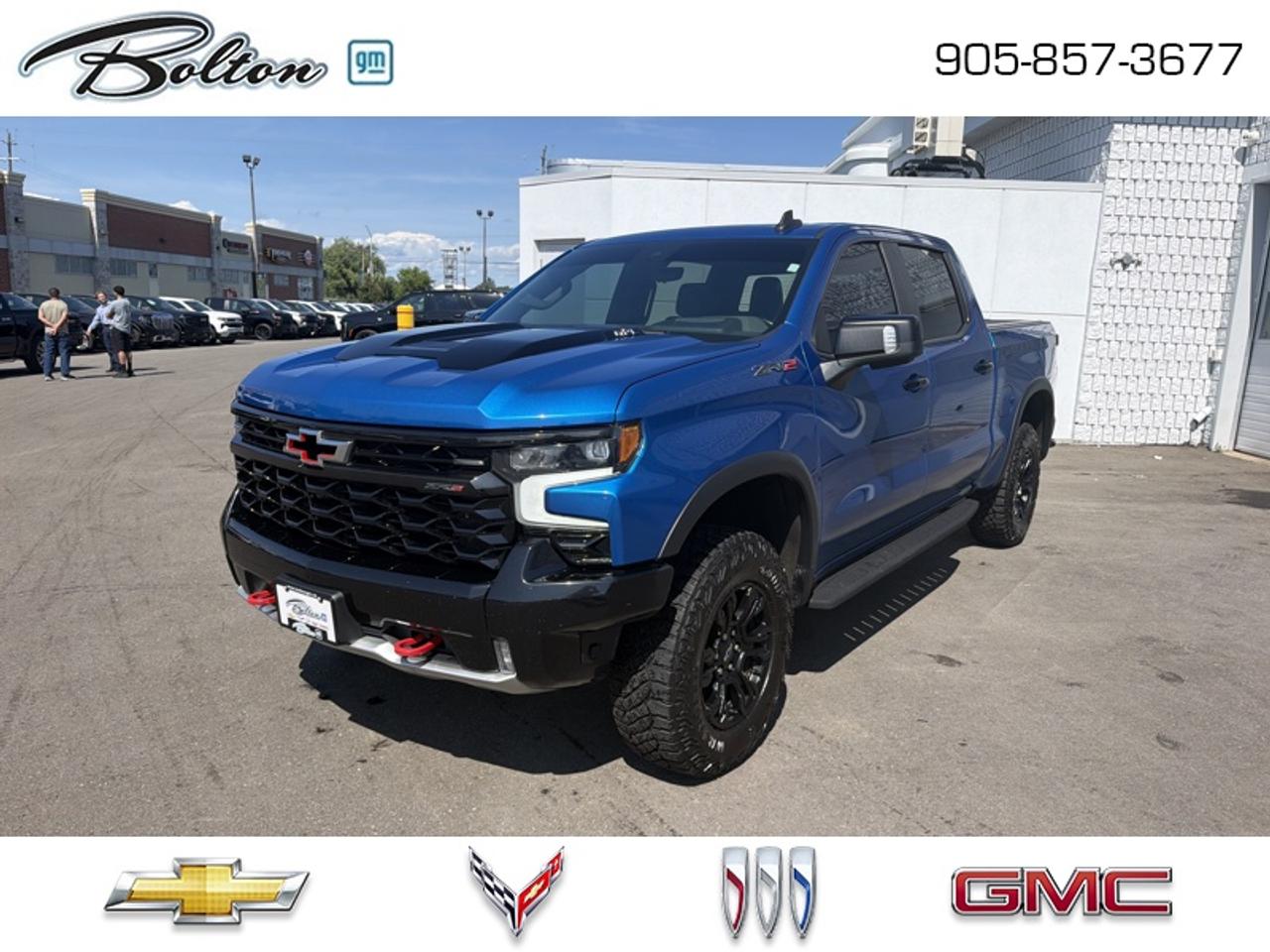 <b>HARD-FOLD TONN COVER INCLUDED<br> <br></b><br>  Our sales staff will help you find that used vehicle you have been looking for - come see us today!<br> <br>This Chevrolet Silverado is a highly refined truck created to be as comfortable as it is capable. This 2022 Chevrolet Silverado 1500 is fresh on our lot in Bolton.<br> <br>Redesigned in 2022 this Chevy Silverado 1500 is functional and ergonomic, suited for the work-site or family life. Bold styling throughout gives it amazing curb appeal and a dominating stance on the road, while the its smartly designed interior keeps every passenger in superb comfort and connectivity on any trip. With brawn, brains and reliability, this muscular pickup was built by truck people, for truck people, and comes from the family of the most dependable, longest-lasting full-size pickups on the road.<br> <br>This Crew Cab 4X4 pickup has 153,678 km. Its Glacier Blue Metallic in colour. It has an Automatic transmission and is powered by a 420HP 6.2L 8 Cylinder Engine. <br> <br> Our Silverado 1500s trim level is ZR2. Making sure your off-road game is on point, this adventure-ready Silverado 1500 ZR2 is ready to power through any extreme terrain you put in front of it. This menacing pickup truck comes loaded with Multimatic DSSV dampers and a highly capable off-road suspension, an exclusive raised hood with black inserts, unique off-road aluminum wheels, underbody skid plates, and a high cut bumper to improve your approach angle. It also comes with Chevrolets Premium Infotainment 3 system that features a larger touchscreen display, wireless Apple CarPlay, wireless Android Auto, and SiriusXM, blind spot detection with trailer alert, remote engine start, an EZ Lift tailgate and a 10 way power driver seat. Additional features include forward collision warning with automatic braking, lane keep assist, intellibeam LED headlights and fog lights, an HD surround vision camera and hill descent control plus so much more! This vehicle has been upgraded with the following features: Leather Seats.<br> <br>To apply right now for financing use this link: <a href=http://www.boltongm.ca/?https://CreditOnline.dealertrack.ca/Web/Default.aspx?Token=44d8010f-7908-4762-ad47-0d0b7de44fa8&Lang=en target=_blank>http://www.boltongm.ca/?https://CreditOnline.dealertrack.ca/Web/Default.aspx?Token=44d8010f-7908-4762-ad47-0d0b7de44fa8&Lang=en</a><br> <br/><br>Call 1-877-626-5866 NOW before this vehicle is sold!!! 
*No Hassles, No Haggles, No Admin Fees,* *JUST OUR BEST PRICE, FIRST*!!!
*** GOOD CREDIT, BAD CREDIT, NO CREDIT, LET OUR FINANCE MANAGERS SHOW YOU THE DIFFERENCE THAT BUYING FROM BOLTON GM WILL MAKE, WE SPECIALIZE IN REBUILDING YOUR CREDIT!!!!*** 
Bolton GM is Only 15 minutes from Hwy 9, 400, 427 and 410
See our complete inventory at www.boltongm.ca
<br> Come by and check out our fleet of 20+ used cars and trucks and 110+ new cars and trucks for sale in Bolton.  o~o