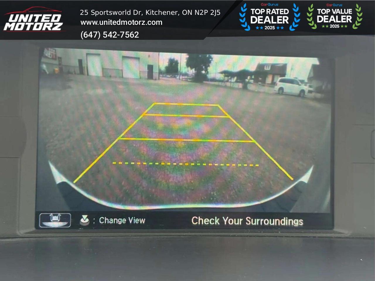 2014 Honda Odyssey 4drWgn Touring w/RES & Navi AUTO FWD 3.5L 6cyl~SAF Photo