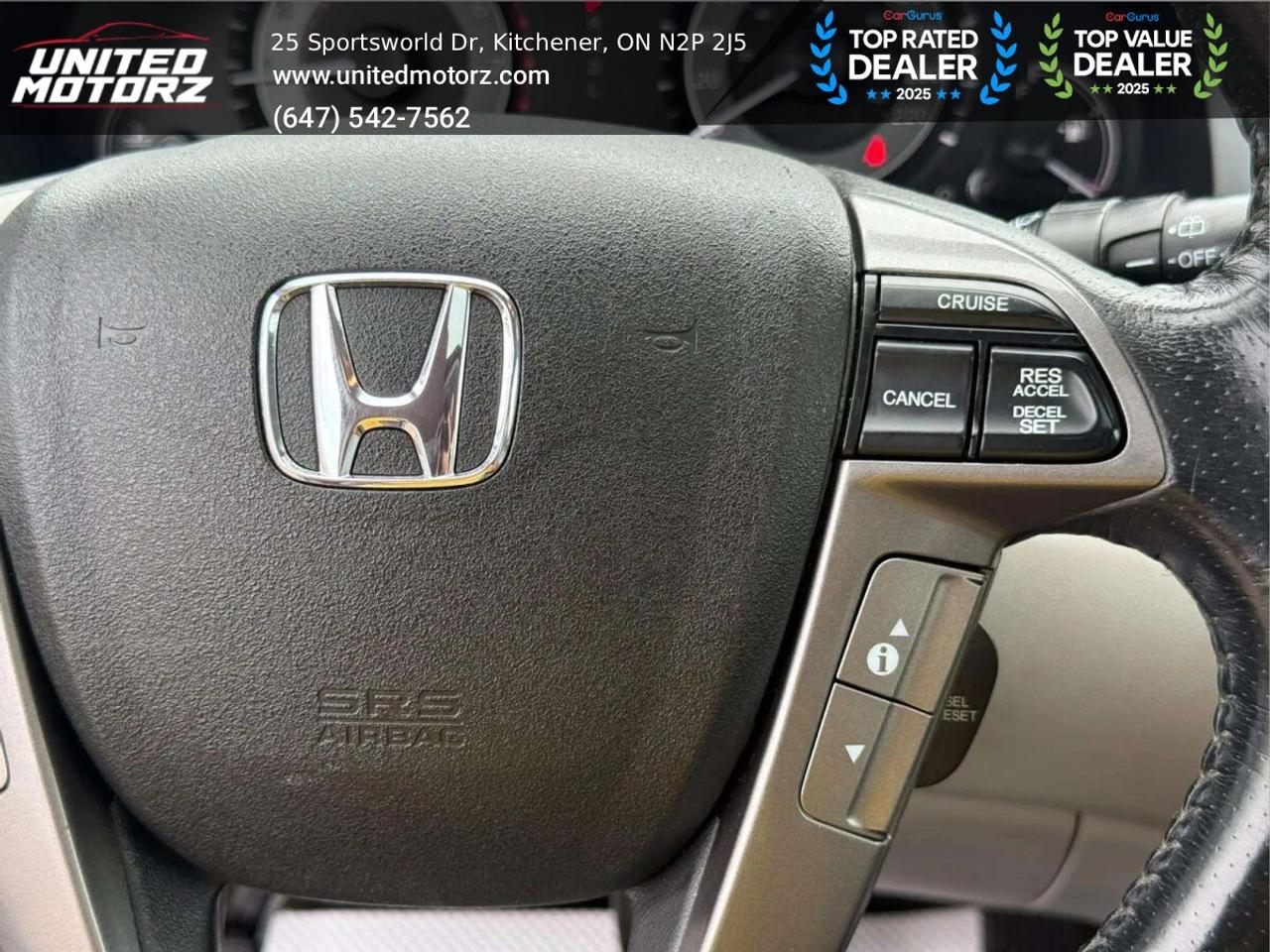 2014 Honda Odyssey 4drWgn Touring w/RES & Navi AUTO FWD 3.5L 6cyl~SAF Photo