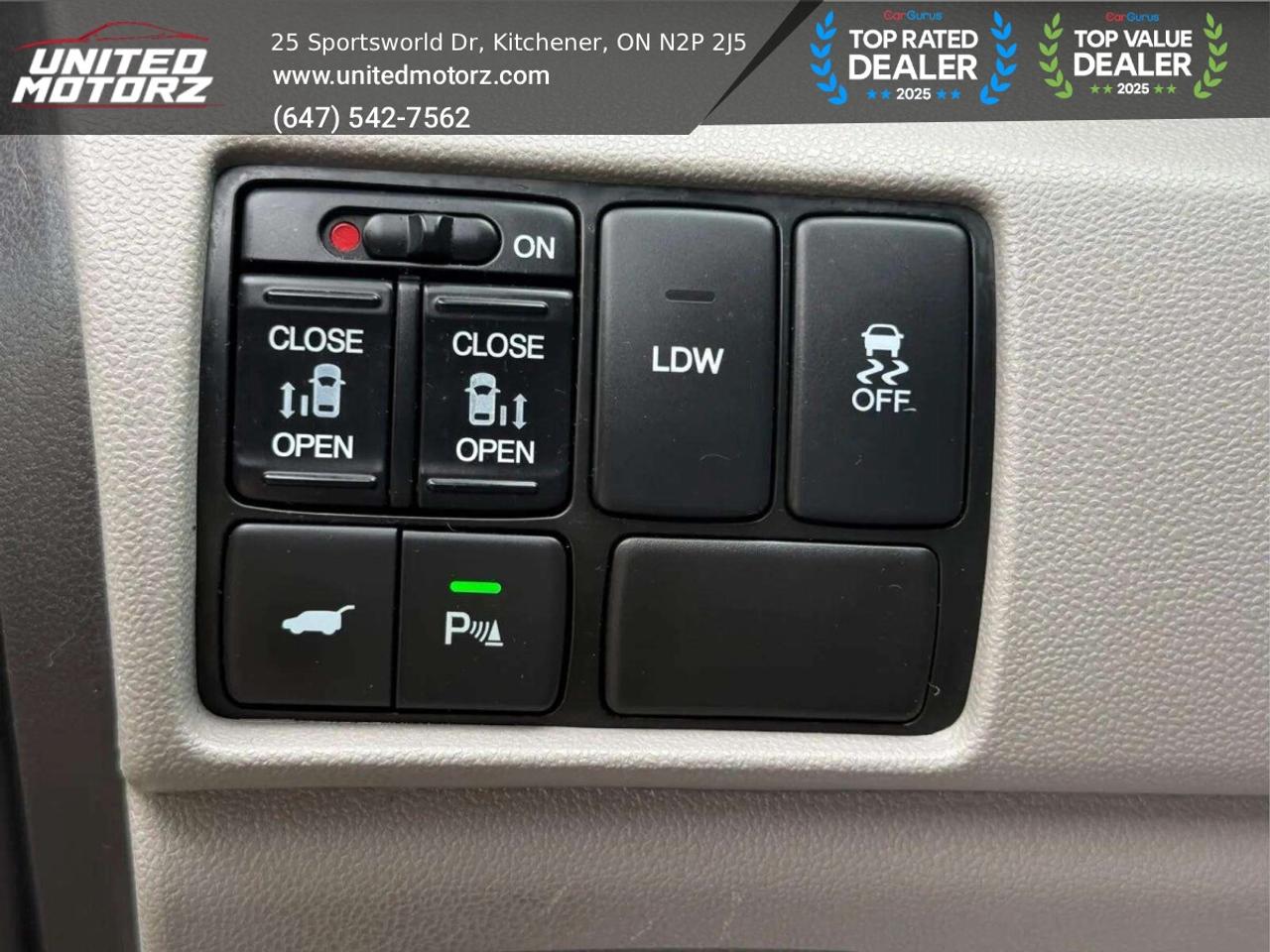2014 Honda Odyssey 4drWgn Touring w/RES & Navi AUTO FWD 3.5L 6cyl~SAF Photo