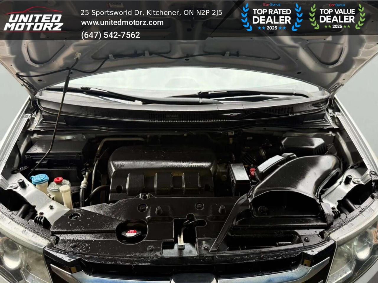 2014 Honda Odyssey 4drWgn Touring w/RES & Navi AUTO FWD 3.5L 6cyl~SAF Photo