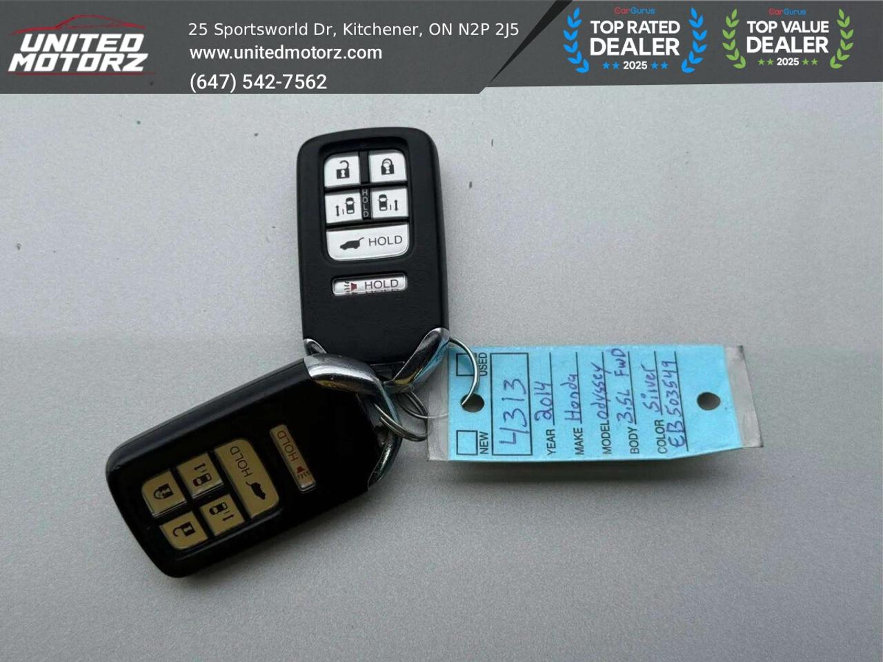 2014 Honda Odyssey 4drWgn Touring w/RES & Navi AUTO FWD 3.5L 6cyl~SAF Photo