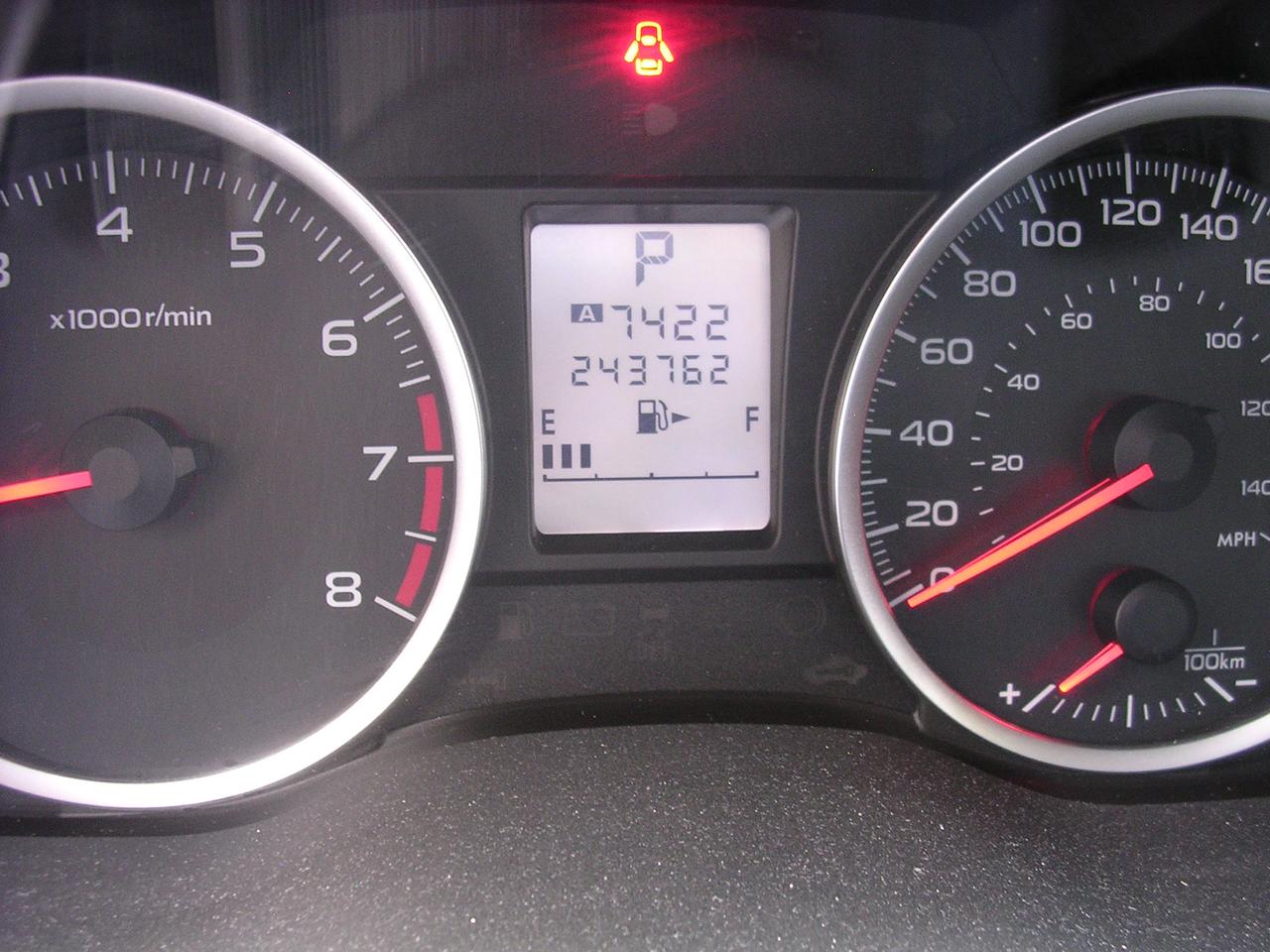2012 Subaru Impreza 4dr Sdn CVT 2.0i w/Touring Pkg Photo