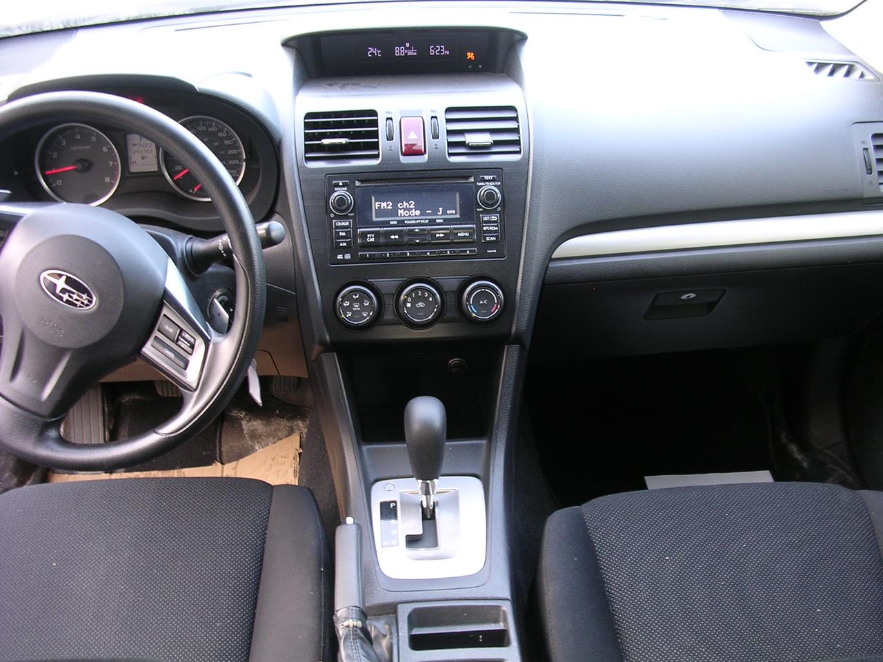 2012 Subaru Impreza 4dr Sdn CVT 2.0i w/Touring Pkg Photo
