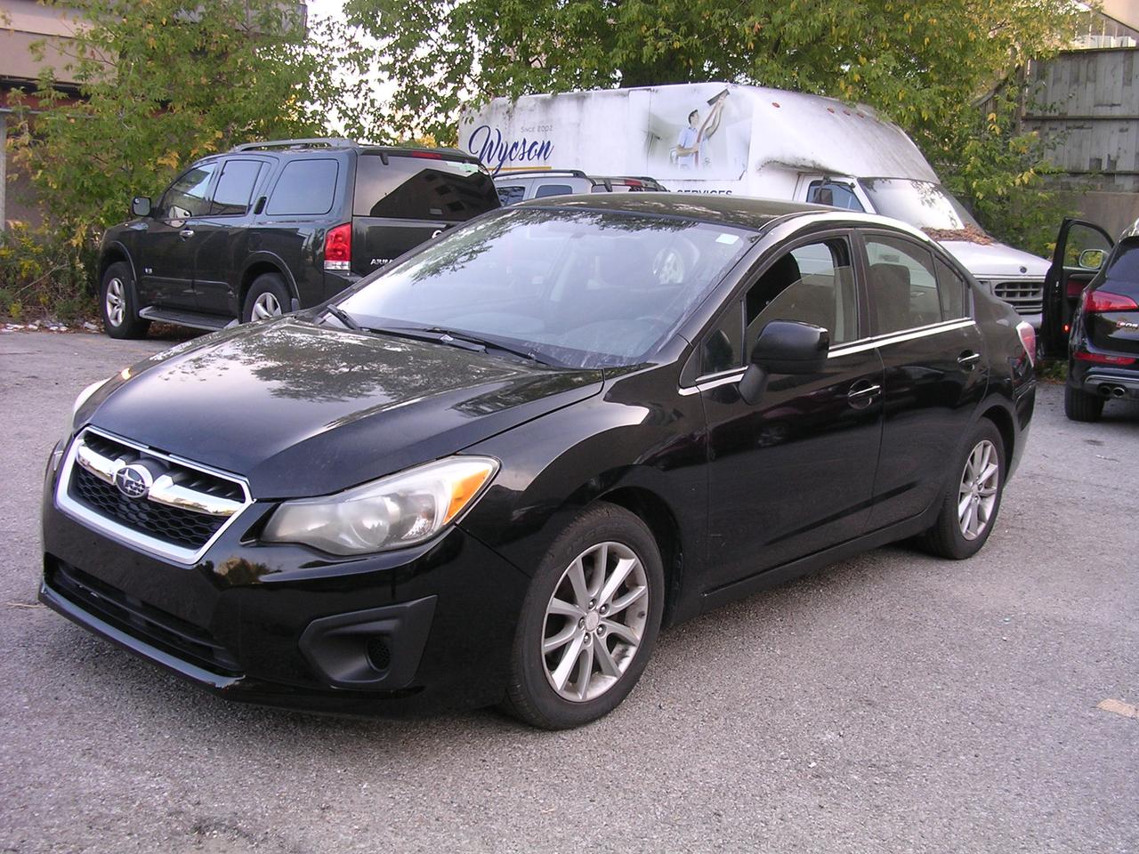 2012 Subaru Impreza 4dr Sdn CVT 2.0i w/Touring Pkg Photo0