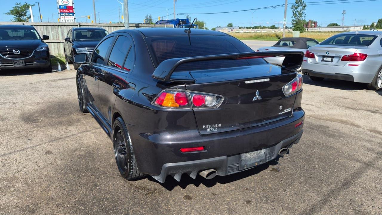2011 Mitsubishi Lancer EVOLUTION MR, TURBO, AWD, AS IS SPECIAL Photo