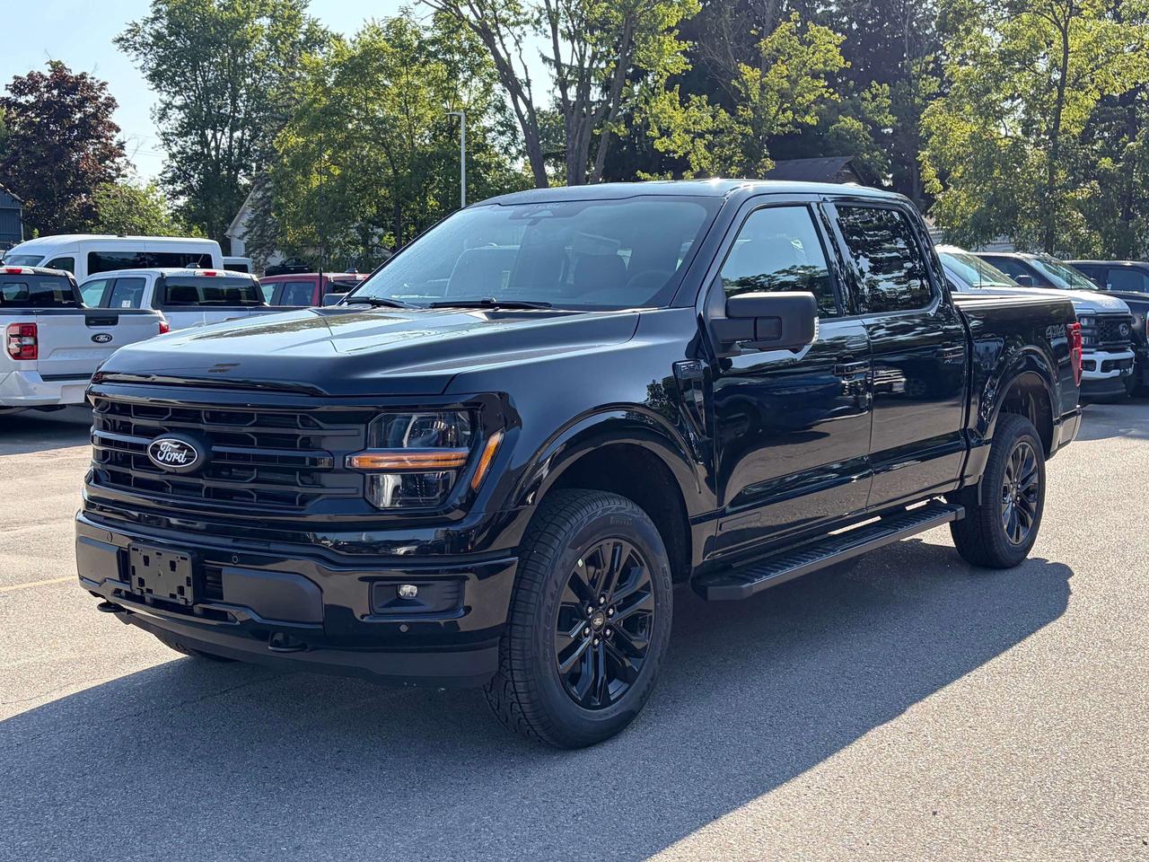 <p>Get ready to experience the future of trucking with the brand new 2026 Ford F-150 XLT 4WD SuperCrew, now available at Winegard Ford! This isnt just any truck; its a powerful, versatile, and technologically advanced machine designed to conquer your workday and your weekend adventures. The impressive 3.5L PowerBoost Full-Hybrid V6 engine delivers exceptional performance and efficiency, while the spacious SuperCrew cabin ensures comfort for you and your crew. Whether youre hauling equipment, towing a trailer, or embarking on a road trip, this F-150 is engineered to exceed your expectations.</p>
<p>This 2026 F-150 XLT is packed with features that make it stand out from the crowd. The XLT Black Appearance Package Plus gives it a bold, aggressive look with a black grille, black exterior badging, and sleek 20" gloss black painted aluminum wheels. Inside, the Mobile Office Package transforms your cabin into a productive workspace with a console workstation and lockable rear storage, perfect for those who need to stay connected on the go. Plus, with the incredible Pro Power Onboard system, you have a mobile generator right in your truck bed, ready to power your tools or campsite.</p>
<p>Here are 5 of the most sizzling features of this new 2026 Ford F-150 XLT:</p>
<ul>
<li><strong>3.5L PowerBoost Full-Hybrid V6 Engine:</strong> Experience the perfect blend of robust power and impressive fuel efficiency, making every drive more capable and economical.</li>
<li><strong>Pro Power Onboard - 7.2KW:</strong> Turn your truck into a mobile power station, capable of running tools, appliances, and more directly from the bed – a game-changer for work and play.</li>
<li><strong>XLT Black Appearance Package Plus:</strong> Command attention with a striking, all-black exterior aesthetic, featuring a black grille, black badging, and stylish 20" gloss black wheels.</li>
<li><strong>Mobile Office Package:</strong> Maximize productivity with a dedicated console workstation and secure rear storage, keeping you organized and connected wherever your work takes you.</li>
<li><strong>BLIS (Blind Spot Information System) with Cross-Traffic Alert and Reverse Brake Assist:</strong> Drive with enhanced confidence thanks to advanced safety features that help you monitor your surroundings and prevent potential collisions.</li>
</ul>
<p><strong><em>Powered by AutoIntelligence™</em></strong></p>
<p>Vehicle information has been generated using artificial intelligence and is provided for informational purposes only. While efforts are made to ensure accuracy, please confirm all details directly with the dealer.</p>
