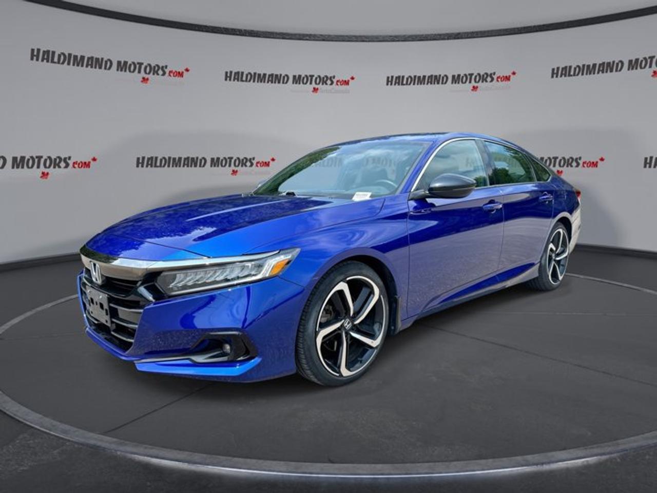 // ACCIDENT FREE!! //<br /><br />This 2021 Honda Accord Sedan SE | No Accidents is a smart midsize sedan that blends comfort, safety, and everyday value. Finished in blue with a black interior, it offers a clean, modern look with four doors, front-wheel drive, and a fuel-friendly 1.5-litre gas engine paired with a CVT.<br /><br />With 80,883 km on the odometer, this used 2021 Honda Accord Sedan SE | No Accidents delivers the smooth ride and strong road manners that have made the Accord a favourite with Canadian drivers. It is well equipped with practical features that make commuting, family travel, and weekend driving easy and enjoyable.<br /><br />FEATURES OF THE Accord Sedan SE | No Accidents<br />   Remote starter adds year-round daily comfort<br />   Heated front seats help cold mornings<br />   Apple CarPlay keeps apps close<br />   Blind spot monitor aids lane changes<br /><br />ADVANCED SAFETY FEATURES<br />   Backup camera helps while reversing safely<br />   Lane departure warning supports highway confidence<br />   Blind spot monitor improves lane awareness<br />   Stability control helps maintain secure handling<br /><br />PERFORMANCE AND EFFICIENCY<br />   1.5-litre gas engine balances power efficiently<br />   Continuously variable transmission shifts very smoothly<br />   Front-wheel drive supports confident daily traction<br />   Cruise control helps relaxed highway driving<br /><br />COMFORT AND CONVENIENCE<br />   Dual-zone climate control keeps comfort balanced<br />   Power driver seat adds easy adjustment<br />   Driver lumbar support helps longer drives<br />   Push button start adds simple convenience<br /><br />TECHNONOLGY AND CONNECTIVITY<br />   Apple CarPlay connects favourite smartphone apps<br />   Android Auto adds easy phone integration<br />   Bluetooth integration supports hands-free calling<br />   Steering wheel audio controls feel intuitive<br /><br />CARGO SPACE<br />   Rear trunk access makes loading simple<br />   Sedan trunk suits daily errands well<br />   Four-door layout improves passenger entry ease<br />   Spare tire adds useful travel readiness<br /><br />AWARDS & RECOGNITIONS<br />   Top Safety Pick, Insurance Institute for Highway Safety, 2021<br />   Best Midsize Car for Families, U.S. News, 2021<br /><br />WHAT OTHER OWNERS LIKE<br />   Smooth ride quality on daily drives<br />   Easy-to-use infotainment with smartphone integration<br />   Great fuel economy for commuting needs<br />   Comfortable cabin with supportive front seats<br /><br />Inside, this 2021 Honda Accord Sedan SE | No Accidents keeps daily driving simple with front air conditioning, automatic climate control, dual-zone climate control, heated front seats, and a leather steering wheel. The adjustable steering wheel, illuminated vanity mirrors, ambient lighting package, and power windows add a polished feel every time you get in.<br /><br />Driver-focused details help this 2021 Honda Accord Sedan SE | No Accidents stand out. You get power steering, a drivers side power seat, lumbar support, automatic headlights, fog lights, heated mirrors, electric mirrors, and turn signal mirrors. The rear spoiler gives the sedan a sporty touch without taking away from its refined look.<br /><br />Safety remains a big strength in this 2021 Honda Accord Sedan SE | No Accidents. It comes equipped with anti-lock braking system, stability control, driver airbag, passenger airbag, side impact airbags, head side airbags, child safety locks, tire pressure monitoring, passenger airbag sensor, and automatic door locks for added peace of mind.<br /><br />Technology is easy to enjoy in this 2021 Honda Accord Sedan SE | No Accidents. Bluetooth integration, Apple CarPlay, Android Auto, steering wheel audio controls, adaptive cruise control, and a backup camera all work together to make each trip more connected and more convenient, whether you are heading across Cayuga or out on the highway.<br /><br />This 2021 Honda Accord Sedan SE | No Accidentss VIN is: 1HGCV1F20MA800750 .<br /><br />WHY CHOOSE US? <br /><br />Honest & Transparent Buying Experience: Weve been a trusted name in business since 1984.<br /><br />STRAIGHTFORWARD PRICING:<br />Our Advertised Price Includes:<br />>>Safety Certification (No separate fee!)<br />>>30-Day 100% Mechanical Warranty<br />>>FREE Carfax History Report.<br />>>No upcharge for paying cash.<br />(Prices Exclude HST and Licensing Fees only.)<br /><br />>>Browse 300+ vehicles all in ONE LOCATION<br /><br />EASY FINANCING: Great rates & open loans<br /><br />WE BUY CARS: Get Top Dollar for your trade-in, or sell us your vehicle for CASH! Even if you dont buy from us!<br /><br />STOP BY TODAY<br />Treat yourself - stop by Haldimand Motors Ltd. located at 42 Talbot St E, Cayuga, ON N0A 1E0 to make this car yours today!<br /><br />https://www.haldimandmotors.com/used/stock-461077.html