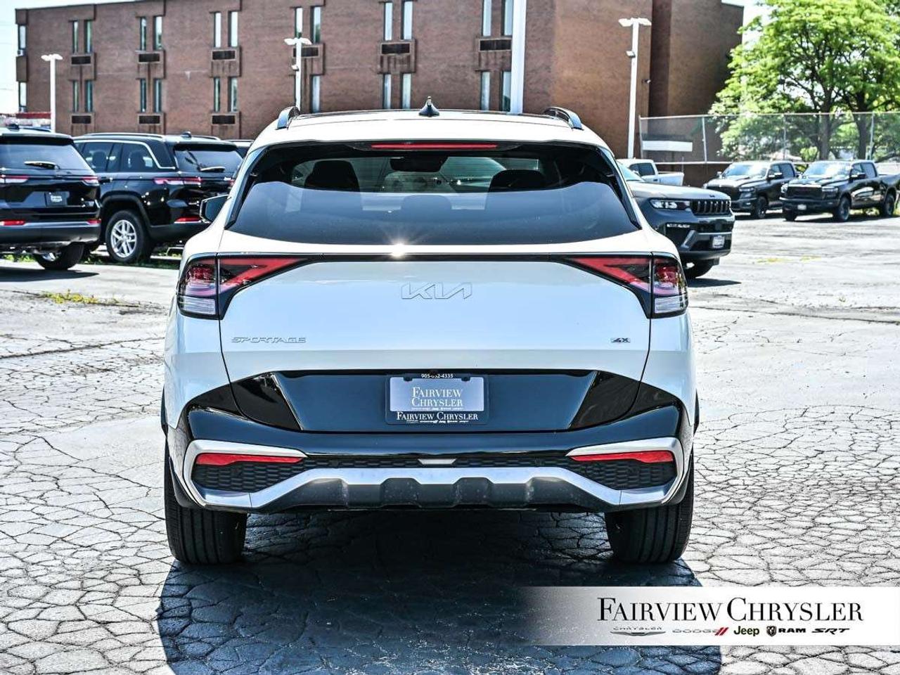 2023 Kia Sportage EX Premium w/Red Interior PANO ROOF   RED LEATHER   NAV   POWER TAILGATE   APPLE CARPLAY Photo