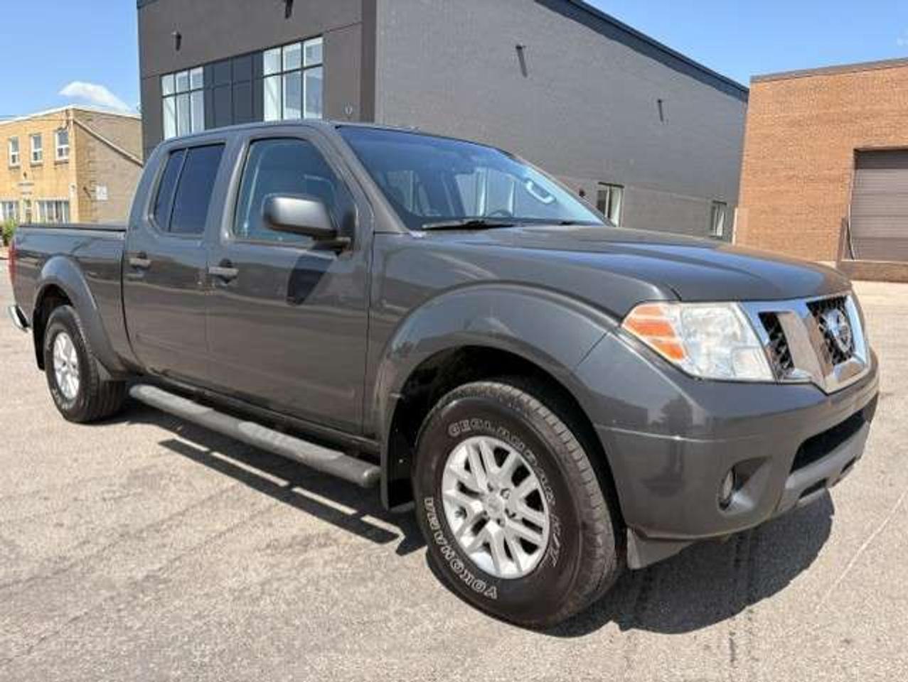 2014 Nissan Frontier SV LWB **4WD-CREW CAB-BACK UP CAMERA** Photo