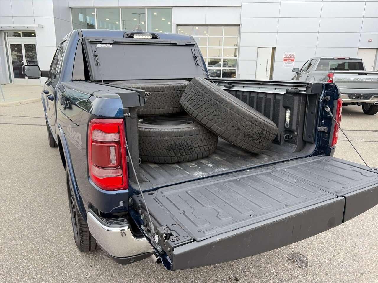 2023 RAM 1500 Limited SWB 2 sets of rims and tires   Harman Kard Photo