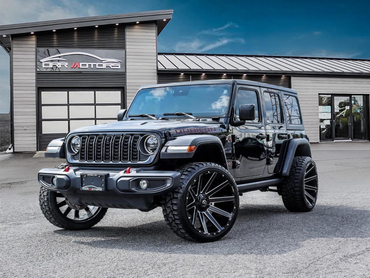 <p>2024 Jeep Wrangler Rubicon 4-Door | Trail-Rated 4x4 | Just 30,234 km — Built for Adventure, Ready for Anything</p><p>This 2024 Jeep Wrangler Rubicon is the icon of off-road capability — Trail Rated and built to handle the toughest terrain Ottawa, Gatineau, and beyond can throw at it. With electronic locking front and rear differentials, a disconnecting front sway bar, beefy off-road tires, and rock rails, the Rubicon is in a league of its own.</p><p>The 4-door body adds family-friendly practicality without sacrificing the open-air freedom that makes a Wrangler a Wrangler. Inside you'll find UConnect with Apple CarPlay and Android Auto, back-up camera, climate control, and all the modern conveniences. With only 30,234 km on the odometer, this Jeep is barely broken in.</p><p>Whether you're heading to the cottage, hitting the trails, or just commuting in style, the Wrangler Rubicon does it all.</p><p>Why Buy from Orr Motors Ottawa: Family-Owned & Operated Dealership Since 1962 Certified & Safety-Inspected Vehicles Competitive Financing Options for All Credit Types Extended Warranty Coverage Available Serving Ottawa, Kanata, Stittsville & Nepean</p><p>Visit us at Orr Motors – 6230 Hazeldean Rd, Ottawa Call: 613-836-3333 | orrmotors.com Orr Motors - The trusted used car dealer in Ottawa since 1962.</p> <br /> <br /> <br /> **Advertised price is for finance purchase. <br /> *Every reasonable effort is made to ensure the accuracy of the information listed above. Vehicle pricing, incentives, options (including standard equipment), and technical specifications listed is for the Year, Make and Model of the vehicle, and may not match the exact vehicle displayed. Please confirm with a sales representative the accuracy of this information.