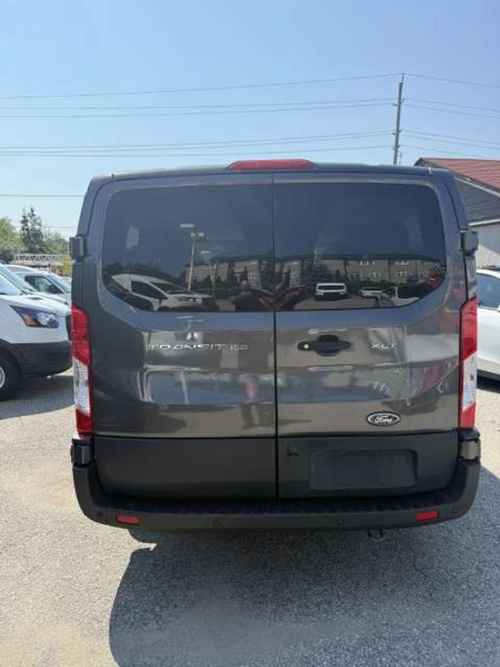 2020 Ford Transit Passenger Wagon 10 passenger van.  Certified Photo