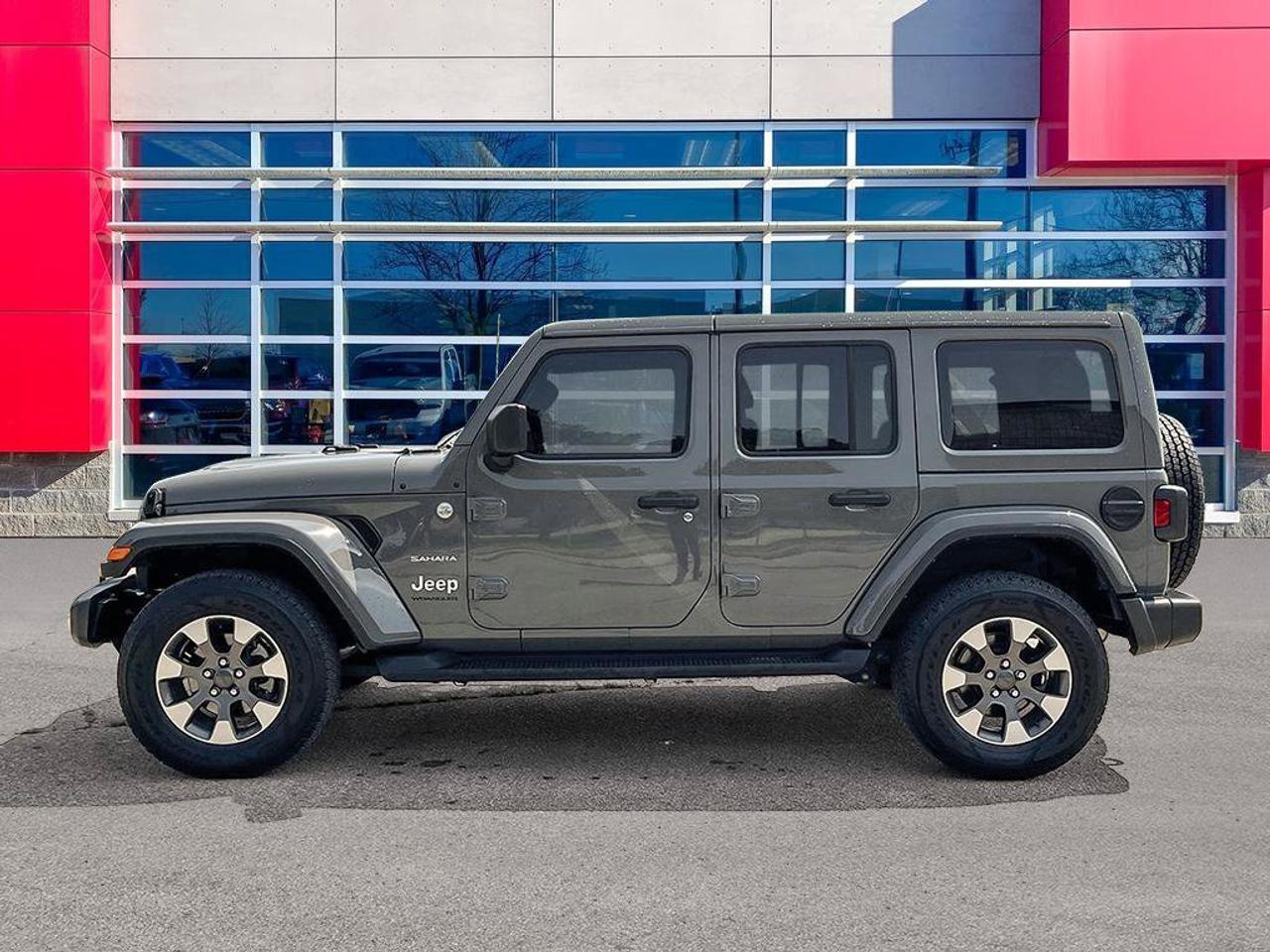 2023 Jeep Wrangler Sahara | One Owner | Clean CarFax | Navigation | Heated Seats & Steering | CarPlay | Android Auto | Photo