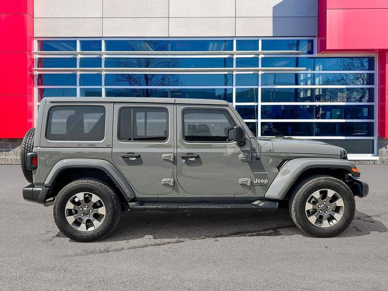 2023 Jeep Wrangler Sahara | One Owner | Clean CarFax | Navigation | Heated Seats & Steering | CarPlay | Android Auto | Photo