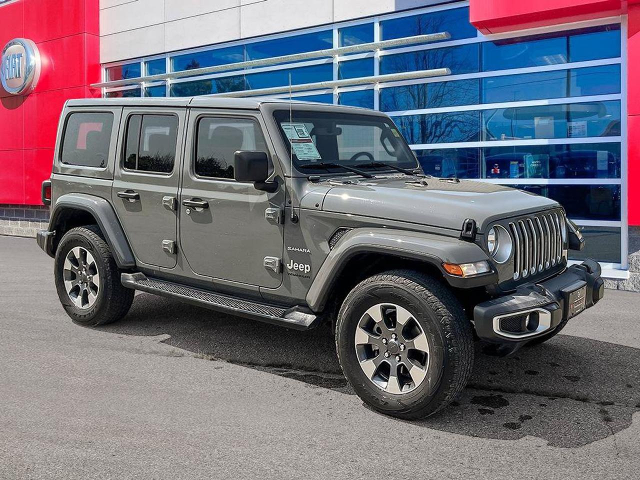 2023 Jeep Wrangler Sahara | One Owner | Clean CarFax | Navigation | Heated Seats & Steering | CarPlay | Android Auto | Photo