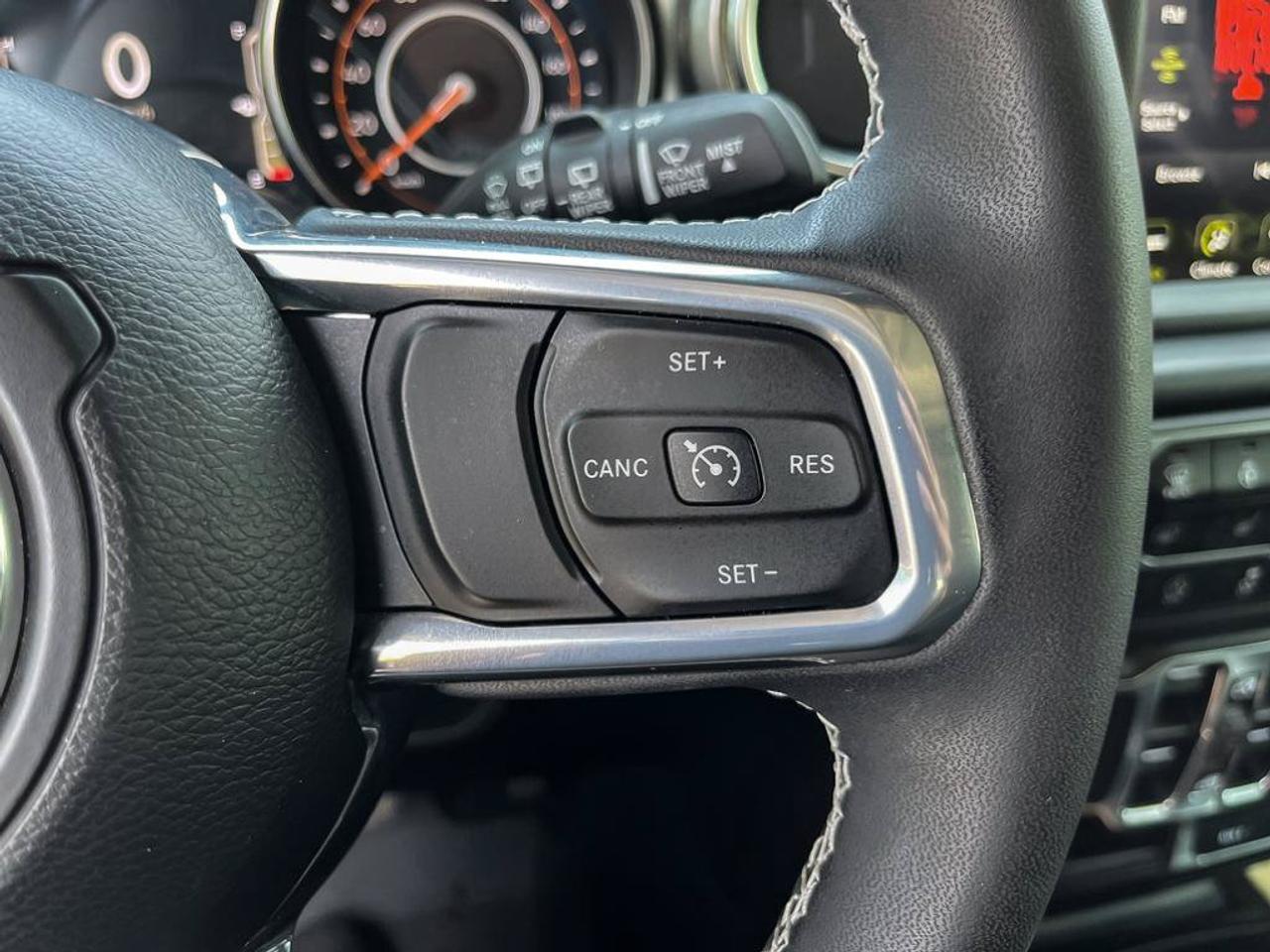 2023 Jeep Wrangler Sahara | One Owner | Clean CarFax | Navigation | Heated Seats & Steering | CarPlay | Android Auto | Photo