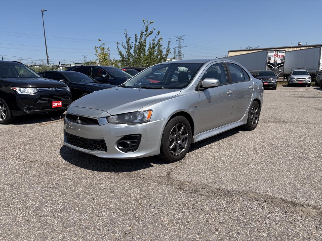 <html>
<p><b>2016 Mitsubishi Lancer – Reliable, Fuel Efficient & Great Condition</b></p>
<p>This 2016 Mitsubishi Lancer is a dependable and economical sedan that’s perfect for daily commuting or a first-time driver. It offers a smooth ride, excellent fuel economy, and a comfortable interior.</p>
<p>Features include:</p>
<p>	●	Clean title</p>
<p>	●	Automatic transmission</p>
<p>	●	Air conditioning & heating</p>
<p>	●	Bluetooth hands-free connectivity</p>
<p>	●	Cruise control</p>
<p>	●	Power windows, locks & mirrors</p>
<p>	●	Keyless entry</p>
<p>	●	AM/FM/CD/USB/AUX audio system</p>
<p>	●	Steering wheel audio controls</p>
<p>	●	Alloy wheels</p>
<p>	●	Well maintained with service records</p>
<p>	●	Professionally detailed</p>
<p>	●	Safety Certified (includes in the price)</p>
<p>	●	Extended warranty options available</p>
<p>A reliable, affordable, and well-maintained vehicle that’s ready for its next owner.</p>
<p>Price: Contact for pricing.</p>
<p>Call or text Reliance Auto: 647-281-2241 to schedule a test drive or for more information.</p>
<p>RELIANCE AUTO </p>
<p>8215 Lawson road </p>
<p>Milton Ontario.</p>
</html>
