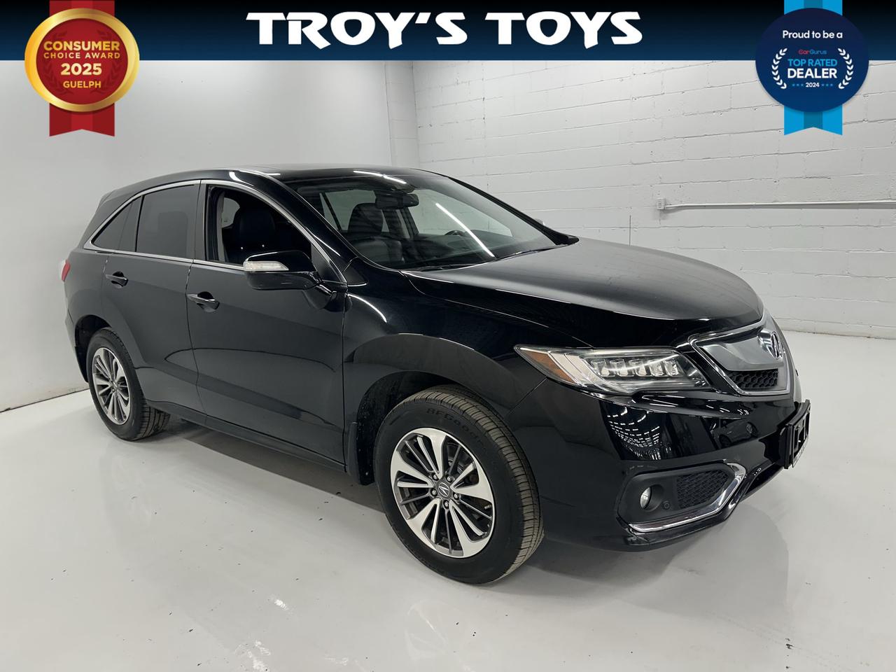 <p>Looking for a stylish and capable SUV that offers a premium driving experience? Troys Toys has the perfect vehicle for you: a sleek, black 2017 Acura RDX Elite package. This sophisticated black-on-black beauty is ready to elevate your daily commute and weekend adventures. Designed with both comfort and performance in mind, this RDX is more than just a vehicle; its your gateway to a more refined and enjoyable driving journey.</p><p>With just 95,401 kilometers on the odometer, this 2017 Acura RDX Elite package represents an excellent opportunity to own a luxury SUV that&rsquo;s been well-maintained and is eager for its next chapter. The RDX is renowned for its smooth ride, responsive handling, and the premium feel that Acura is known for. Whether youre navigating city streets or venturing onto the open road, youll appreciate the blend of power and efficiency this all-wheel-drive crossover provides.</p><p>At Troys Toys, we understand what discerning drivers are looking for, and this 2017 Acura RDX Elite pkg truly delivers. Its spacious interior, coupled with a suite of advanced features, makes every drive a pleasure. This SUV is perfectly suited for families, professionals, or anyone who values a blend of luxury, practicality, and performance. Come experience the difference at Troys Toys!</p><p>Here are 5 features that truly make this 2017 Acura RDX Elite package shine:</p><ul><li><strong>Elite Package Luxury:</strong> Experience the pinnacle of Acuras offering with the Elite package, which bundles top-tier comfort and convenience features for an unmatched driving environment.</li><li><strong>All-Wheel Drive Capability:</strong> Conquer any Canadian weather with confidence thanks to the intelligent all-wheel-drive system, providing superior traction and stability in rain, snow, or shine.</li><li><strong>Premium Black Leather Interior:</strong> Sink into the rich, black leather seats that exude sophistication and offer supreme comfort for both driver and passengers on every journey.</li><li><strong>Powerful and Refined Gasoline Engine:</strong> Enjoy a dynamic and smooth driving experience with the potent gasoline engine, delivering ample power when you need it while maintaining impressive fuel efficiency.</li><li><strong>Sleek Black Exterior:</strong> Turn heads with the classic and commanding black exterior paint, a timeless colour that enhances the RDXs sporty yet elegant SUV profile.</li></ul><p><strong><em>Powered by AutoIntelligence&trade;</em></strong></p><p>Vehicle information has been generated using artificial intelligence and is provided for informational purposes only. While efforts are made to ensure accuracy, please confirm all details directly with the dealer.</p>
