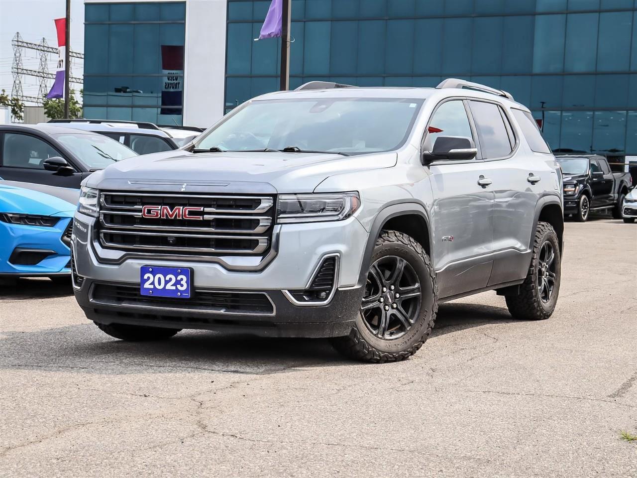 <p>The 2023 GMC Acadia AWD AT4, with its refined gray exterior and robust all-wheel-drive system, delivers exceptional performance and handling ready to tackle any journey.</p> <p>Step inside its black leather interior, where sophistication meets convenience with features like a moon roof that opens up the cabin to the skies above. This SUV embodies practicality with its trailer package and enhanced driving performance courtesy of the Driver's Package. The third row of seating ensures room for everyone, while the capacious interior offers substantial cargo space for all your adventures.</p> <p>Cutting-edge technology graces this Acadia, featuring a modern Heads-Up Display that keeps you informed while keeping your focus on the road. The infotainment system is equipped with Apple CarPlay integration, satellite radio, and a Wi-Fi hotspot for seamless connectivity on the go. Advanced safety features such as lane assist, a backup camera, and multiple driver assistance technologies ensure peace of mind on every drive.</p> <p>This versatile SUV is perfect for the adventurous family or the technology enthusiast looking for a reliable ride. Contact Summit Ford today to explore the impressive capabilities of the GMC Acadia AT4 and schedule a test drive!</p>