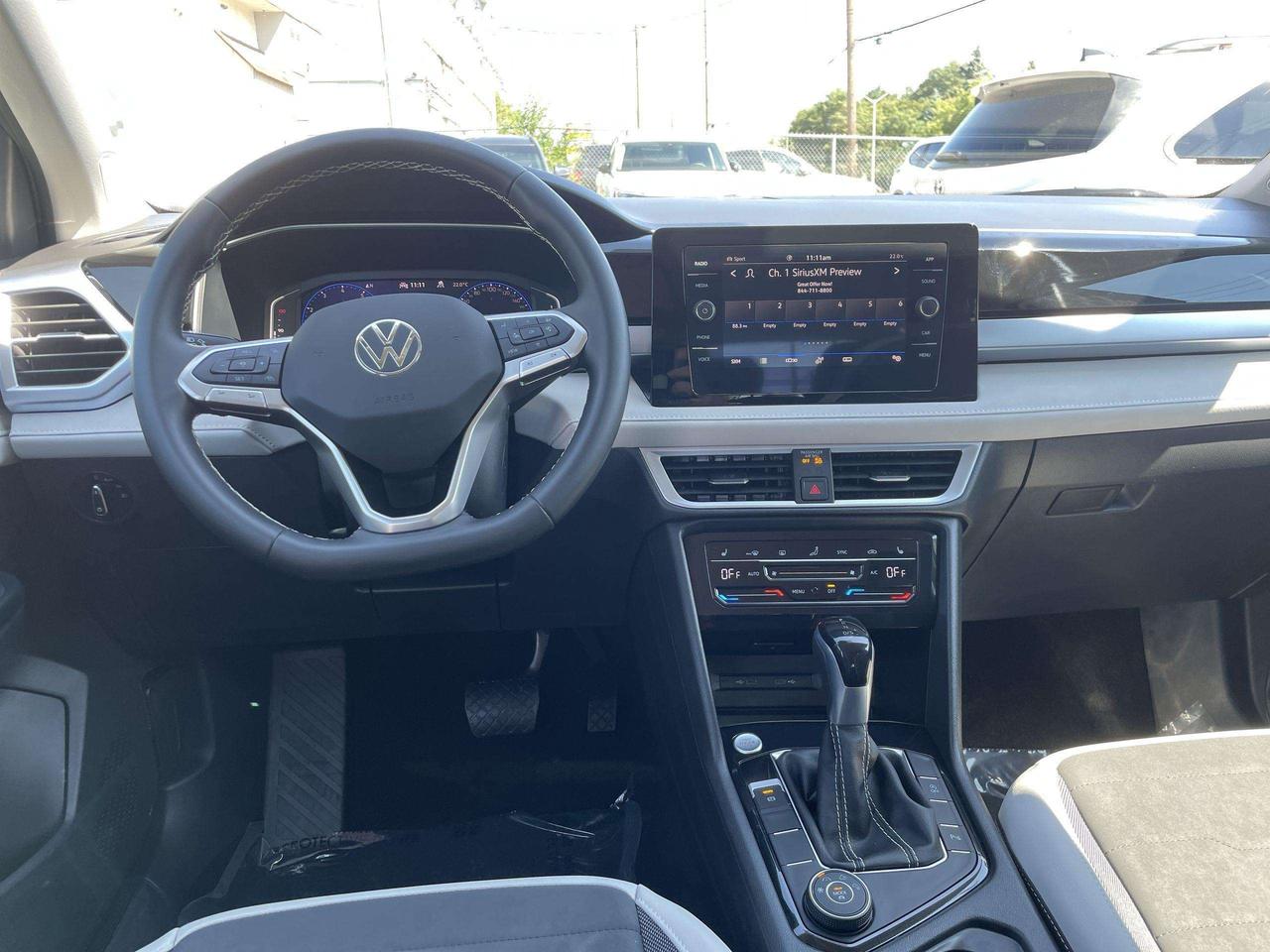 2025 Volkswagen Taos Comfortline LIKE NEW!!  4MOTION, BLIS, HTD.SEATS, BK. CAM, ALLOYS Photo