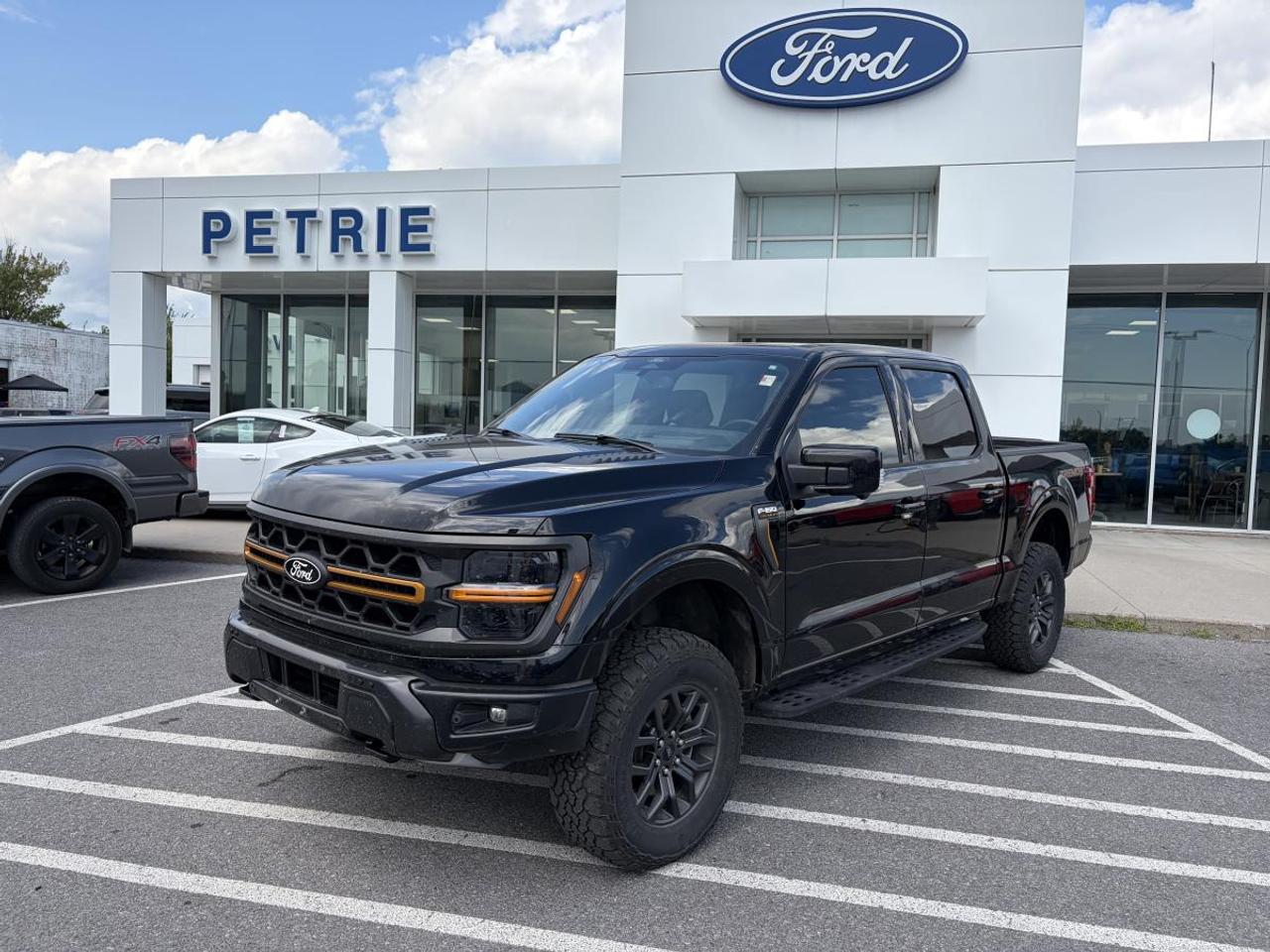 Built Ford tough! Here is a 2024 Ford F-150 Tremor. Powered by a 3.5L V6 ecoboost engine with an electronic 10-speed automatic transmission that delivers legendary performance and towing capability. The 2024 Ford F-150 Tremor is a powerful pickup truck designed to tackle every job. No reported accidents! Everything you expect from a truck and more, check out the 2024 Ford F-150 Tremor today! Key Features: >> Equipment group 402A >> Bed utility package >> Mobile office package >> Tow/haul package >> B&O unleashed sound system >> Twin panel moonroof >> 12 inch productivity screen >> Trailer hitch class IV >> Pro trailer backup assist >> Pro trailer hitch assist >> Unique front knuckles >> Adaptive cruise control >> Power tailgate lock >> Lane keeping system >> Tire pressure monitoring system >> Pickup box tie down hooks >> Trailer sway control >> 12V powerpoints >> FORDPASS CONNECT and so much more! This 2024 Ford F-150 Tremor is available now at Petrie Ford. We are located at 1388 Bath Road in Kingston, Ontario. Come schedule a test drive today!<p>Built Ford tough! Here is a 2024 Ford F-150 Tremor. Powered by a 3.5L V6 ecoboost engine with an electronic 10-speed automatic transmission that delivers legendary performance and towing capability. The 2024 Ford F-150 Tremor is a powerful pickup truck designed to tackle every job. No reported accidents! Everything you expect from a truck and more</p>
<p> check out the 2024 Ford F-150 Tremor today! Key Features: >> Equipment group 402A >> Bed utility package >> Mobile office package >> Tow/haul package >> B&O unleashed sound system >> Twin panel moonroof >> 12 inch productivity screen >> Trailer hitch class IV >> Pro trailer backup assist >> Pro trailer hitch assist >> Unique front knuckles >> Adaptive cruise control >> Power tailgate lock >> Lane keeping system >> Tire pressure monitoring system >> Pickup box tie down hooks >> Trailer sway control >> 12V powerpoints >> FORDPASS CONNECT and so much more! This 2024 Ford F-150 Tremor is available now at Petrie Ford. We are located at 1388 Bath Road in Kingston</p>