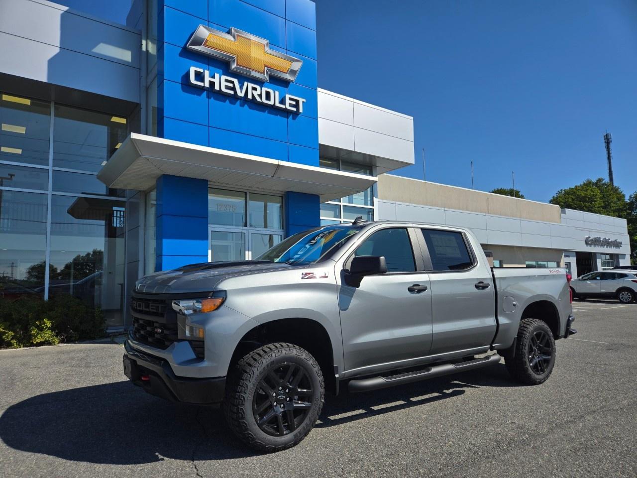 <p><strong>2026 Chevrolet Silverado 1500 Custom Trail Boss 4x4</strong></p><p>Ready for both the job site and the trail, this <strong>2026 Silverado Custom Trail Boss</strong> comes finished in <strong>Sterling Grey Metallic</strong> with a spacious <strong>Crew Cab Short Box</strong> configuration. Powered by a <strong>5.3L V8 engine</strong> paired with a smooth <strong>10-speed automatic transmission</strong>, it delivers the iconic V8 power and capability you need.</p><p><strong>Key Highlights:</strong></p><ul><li><p><strong>Factory Off-Road Ready:</strong> Equipped with a 2-inch factory lift, Z71 Off-Road suspension with monotube shocks, skid plates, and bold 20-inch High Gloss Black aluminum wheels.</p></li><li><p><strong>Towing & Utility:</strong> Features an integrated trailer brake controller, Chevytec spray-on bedliner, rear wheelhouse liners, 4-inch black round assist steps, and 120-volt bed power.</p></li><li><p><strong>Cabin Comfort & Tech:</strong> Jet Black cloth interior, 10-way power driver seat and remote start</p></li></ul><p>Visit us today at <strong>Upper Canada Chevrolet</strong> or contact our sales team to book your test drive!</p>