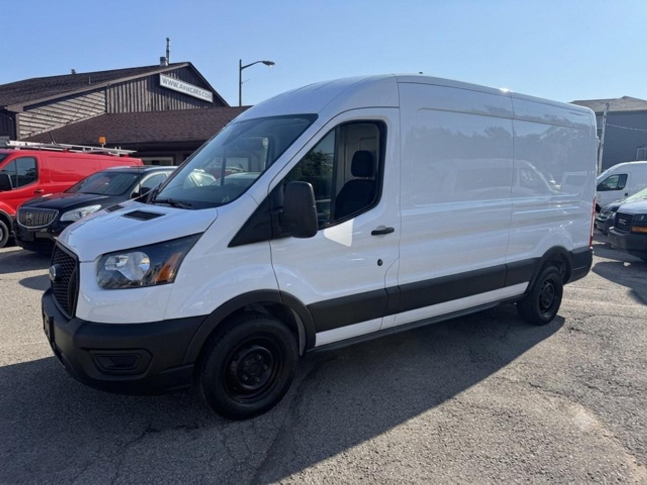 2021 Ford Transit Cargo Van Mid Roof, Certified. Photo