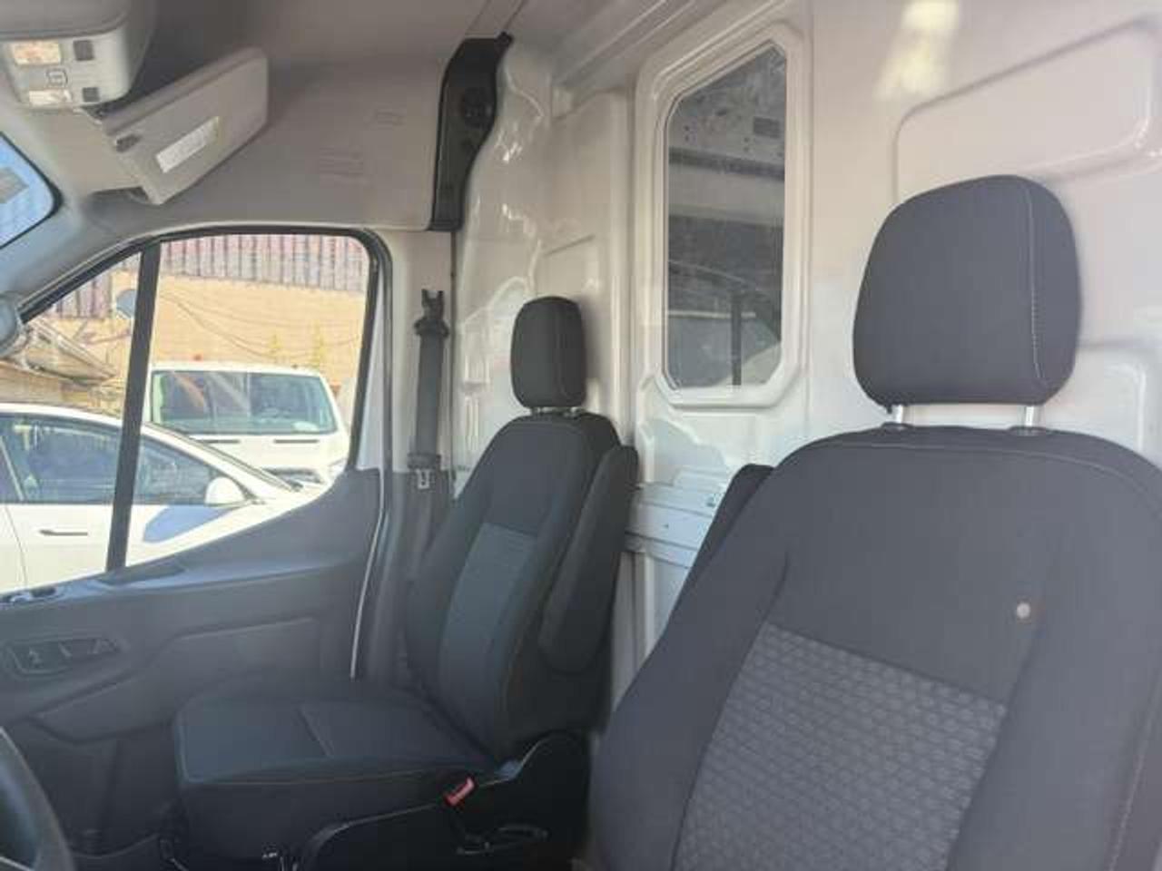 2021 Ford Transit Cargo Van Mid Roof, Certified. Photo