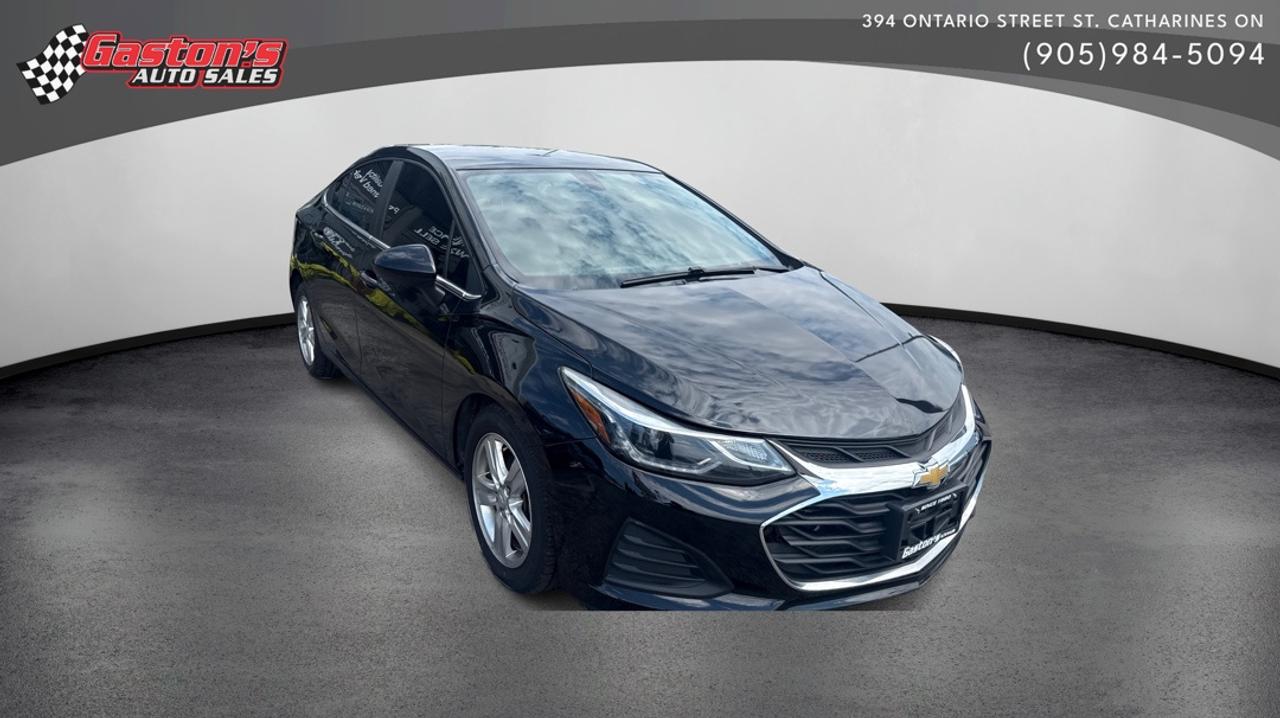 <p class=mb-3 last:mb-0><strong>Drive smarter with this 2019 Chevrolet CRUZE LT&mdash;packed with modern convenience features that make every journey effortless.</strong></p><p class=mb-3 last:mb-0>&bull; Remote Start & Keyless Go for ultimate convenience<br>&bull; Reverse Camera for confident parking and safety<br>&bull; Vocal Assist Telematics keeps you connected hands-free<br>&bull; Cruise Control and Power Steering for relaxed driving<br>&bull; Front Heated Seats for winter comfort<br>&bull; Dual Front Air Bags and Traction Control for peace of mind<br>&bull; Satellite Radio and AM/FM for endless entertainment</p><p class=mb-3 last:mb-0>This CRUZE LT combines practicality with modern technology. The Remote Start feature means your car is warm and ready before you step outside on cold mornings, while the Keyless Go system eliminates fumbling for keys. The integrated Reverse Camera takes the guesswork out of backing up, giving you a clear view of obstacles behind you&mdash;a feature thats saved countless drivers from costly mistakes.</p><p class=mb-3 last:mb-0>Whether youre commuting through city traffic or taking a weekend getaway, this sedan adapts to your lifestyle. The intuitive Vocal Assist Telematics system keeps you connected safely, the Satellite Radio provides premium entertainment options, and the front heated seats transform winter drives into cozy experiences. Youll appreciate the responsive Power Steering and smooth Cruise Control on longer highways, letting you arrive refreshed rather than fatigued.</p>