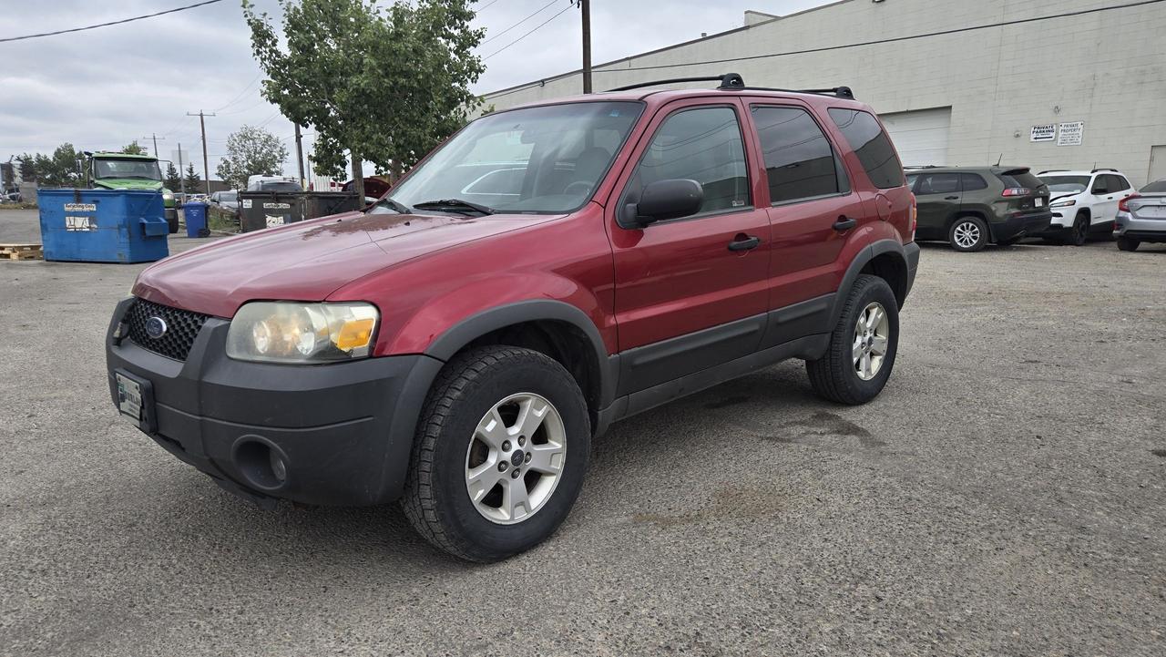 <p>2005 Ford Escape &ndash; 3.0L V6 4WD<br>Capable &bull; Spacious &bull; Winter-Ready SUV</p><p>💲 Price: $4200.00+ GST<br>📍 5701 17 Ave SE #170, Calgary AB T2A 0W3<br>📊 Mileage: 185,317 KM<br>🆔 Stock #: 0622</p><p>Looking for a capable and affordable 4WD SUV? This 2005 Ford Escape XLT 3.0L V6 delivers strong performance, spacious interior, and true 4-wheel drive capability &mdash; perfect for Calgary winters and beyond!</p><p>✅ Features:<br>&bull; 3.0L V6 Engine &ndash; more power for towing & highway driving<br>&bull; Four-Wheel Drive (4WD) &ndash; confident in all conditions<br>&bull; Front Tires: Cooper Discoverer AT3 &ndash; 7/32 tread depth 🛞<br>&bull; Rear Tires: Sailun Terramax CVR &ndash; 7/32 tread depth 🛞<br>&bull; Power windows & locks<br>&bull; Cruise control<br>&bull; Air conditioning & heat<br>&bull; Spacious cargo area<br>&bull; Runs and drives well</p><p>✔ Comes With:<br>&bull; Mechanical Fitness Assessment<br>&bull; Insurance Inspection<br>&bull; FREE Carfax Report</p><p>📱 Text: (403) 971-9713<br>📞 Call or Text: (403) 613-2276<br>☎ Office: (403) 248-4881 (8am&ndash;5pm)</p><p>JJ Auto Sales & Services<br>5701 17 Ave SE #170, Calgary AB T2A 0W3<br>Message us now to book your test drive! 🚙</p>